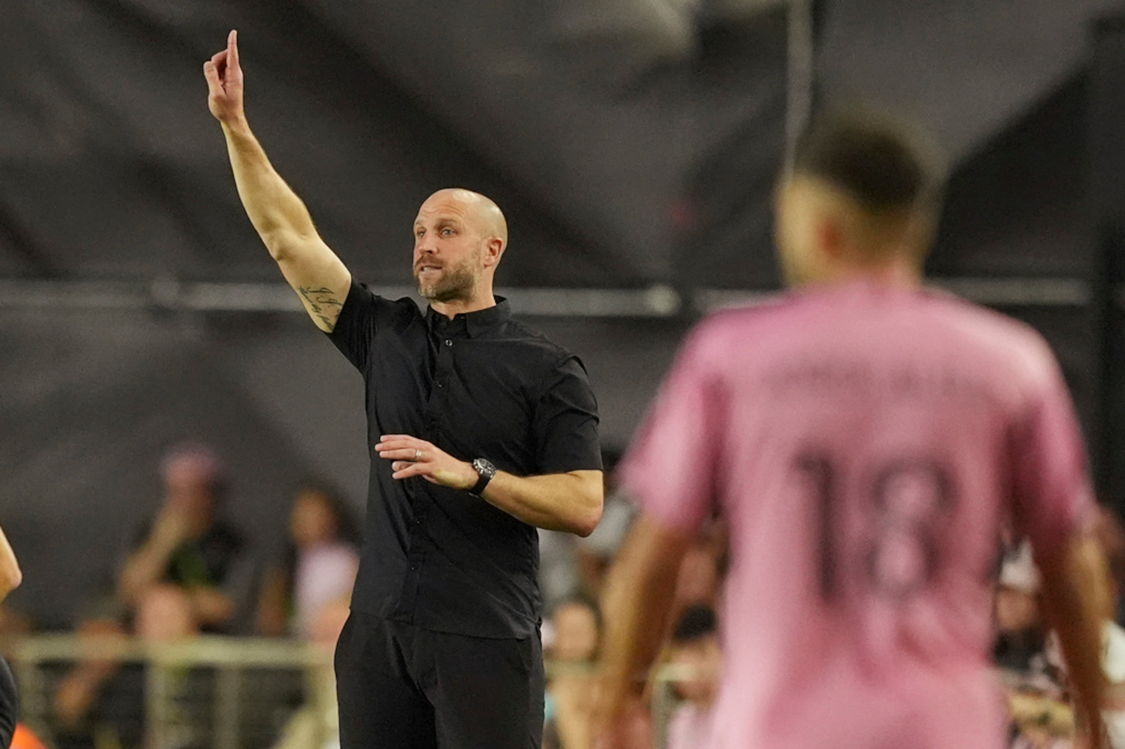 Atlanta United head coach Rob Valentino gestures during the first half of an MLS playoff opening round soccer match against Inter Miami, Saturday, Nov. 9, 2024, in Fort Lauderdale, Fla. (AP Photo/Rebecca Blackwell)