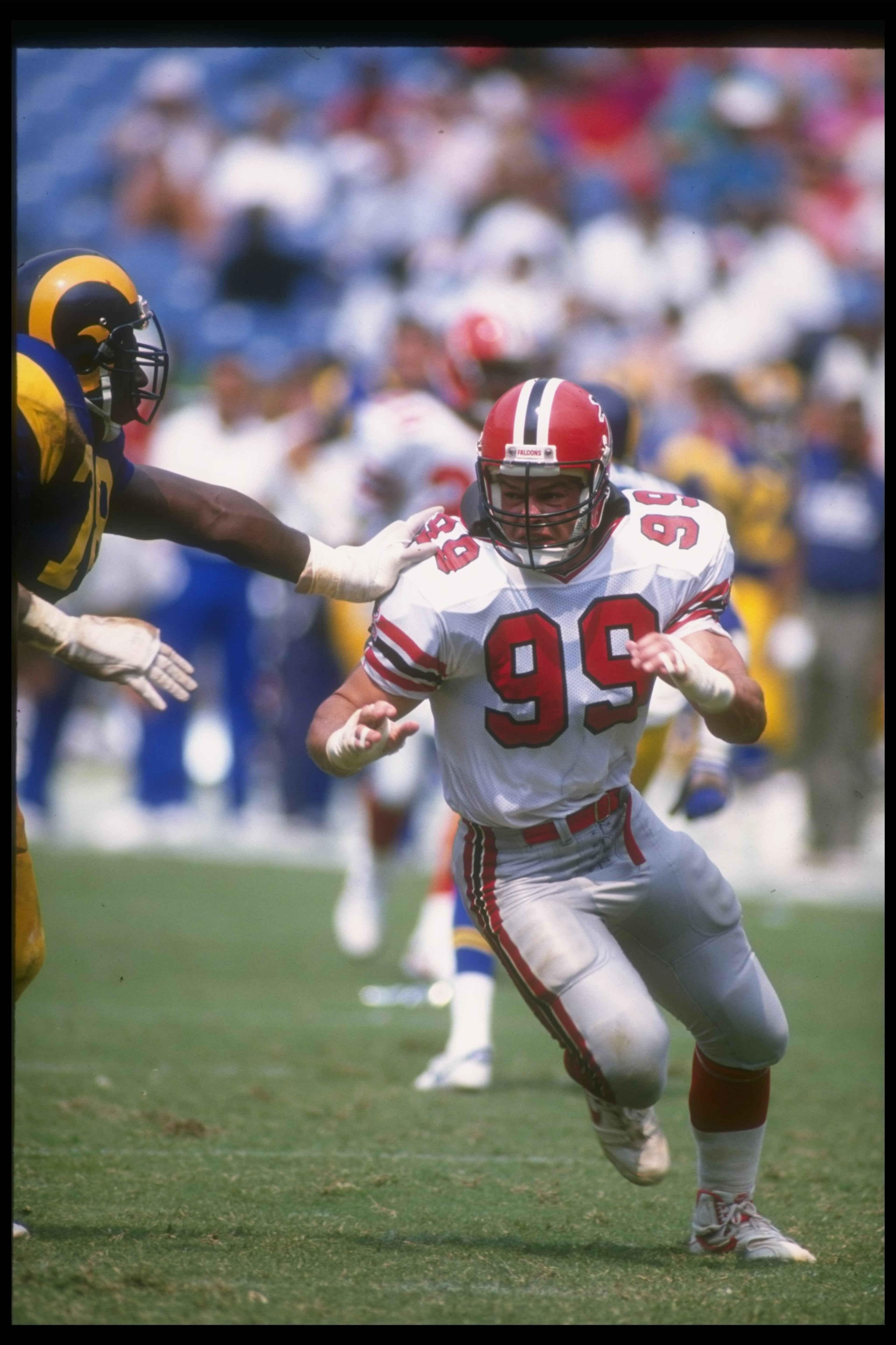 Tim Green of the Falcons rushes the passer during a game against the Los Angeles Rams at the Fulton County Stadium in Atlanta, Georgia. Allen Dean Steele /Allsport