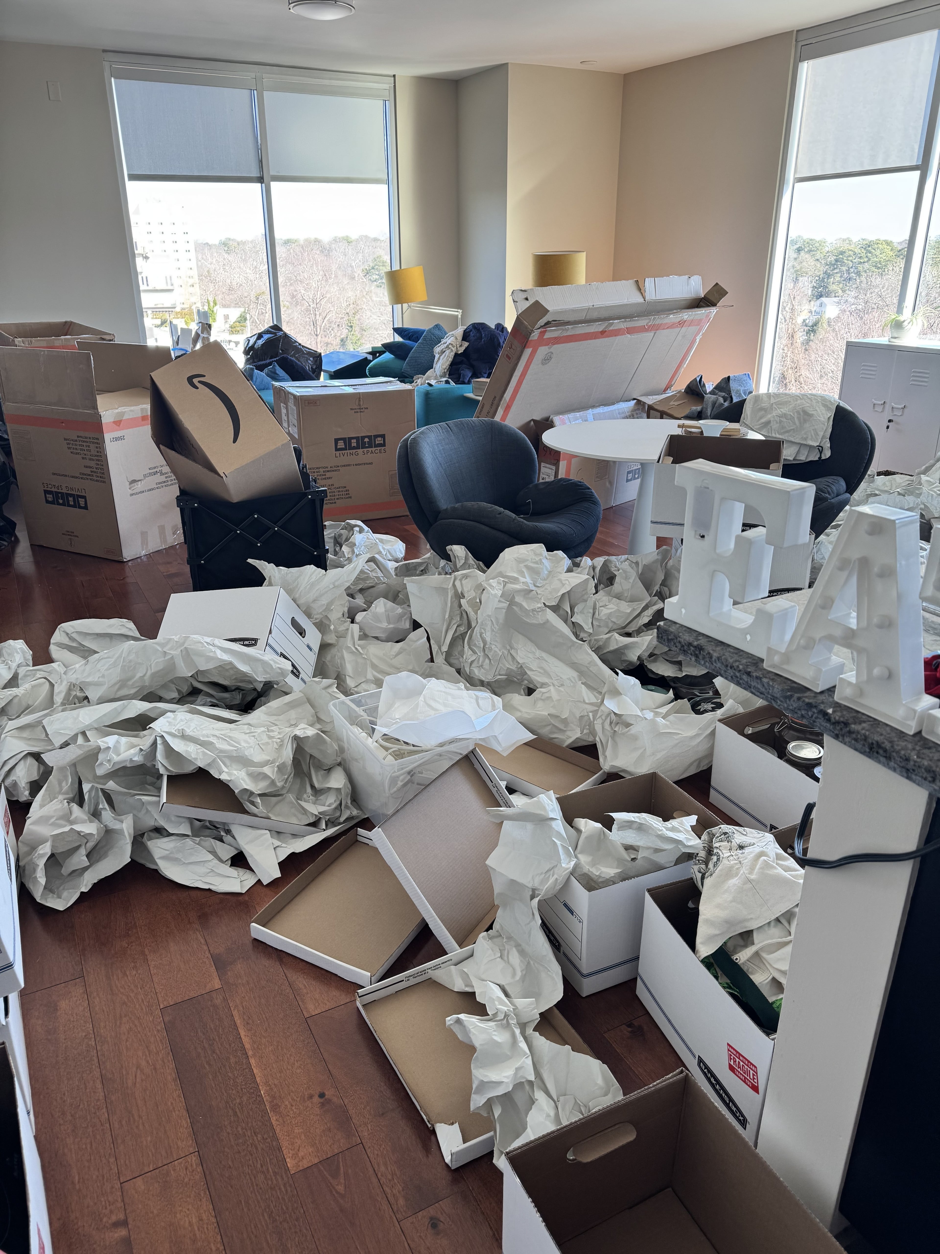 Monti Carlo's new apartment is in the midst of unpacking mayhem with boxes, crates and bubble wrap. (Monti Carlo/AJC)