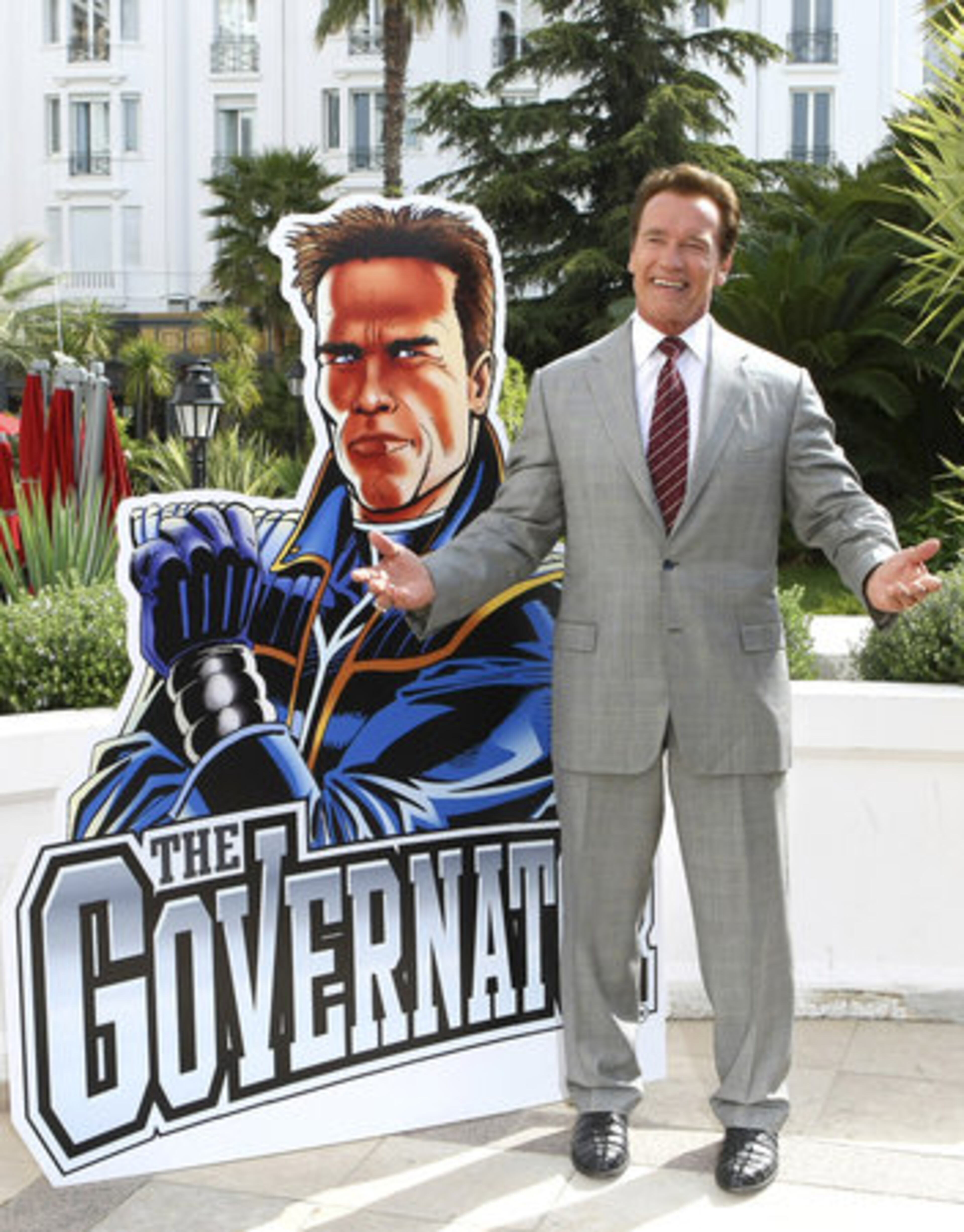 C'MON GUYS, IT'S GOING TO BE EVEN BETTER THAN 'TERMINATOR'! Actor and former California Governor Arnold Schwarzenegger, poses for photographers during the MIPTV (International Television Programme Market), Monday, April 4, 2011, in Cannes, southern France. Arnold Schwarzenegger is back in Cannes for the first time in eight years to unveil a new international television series "The Governator".