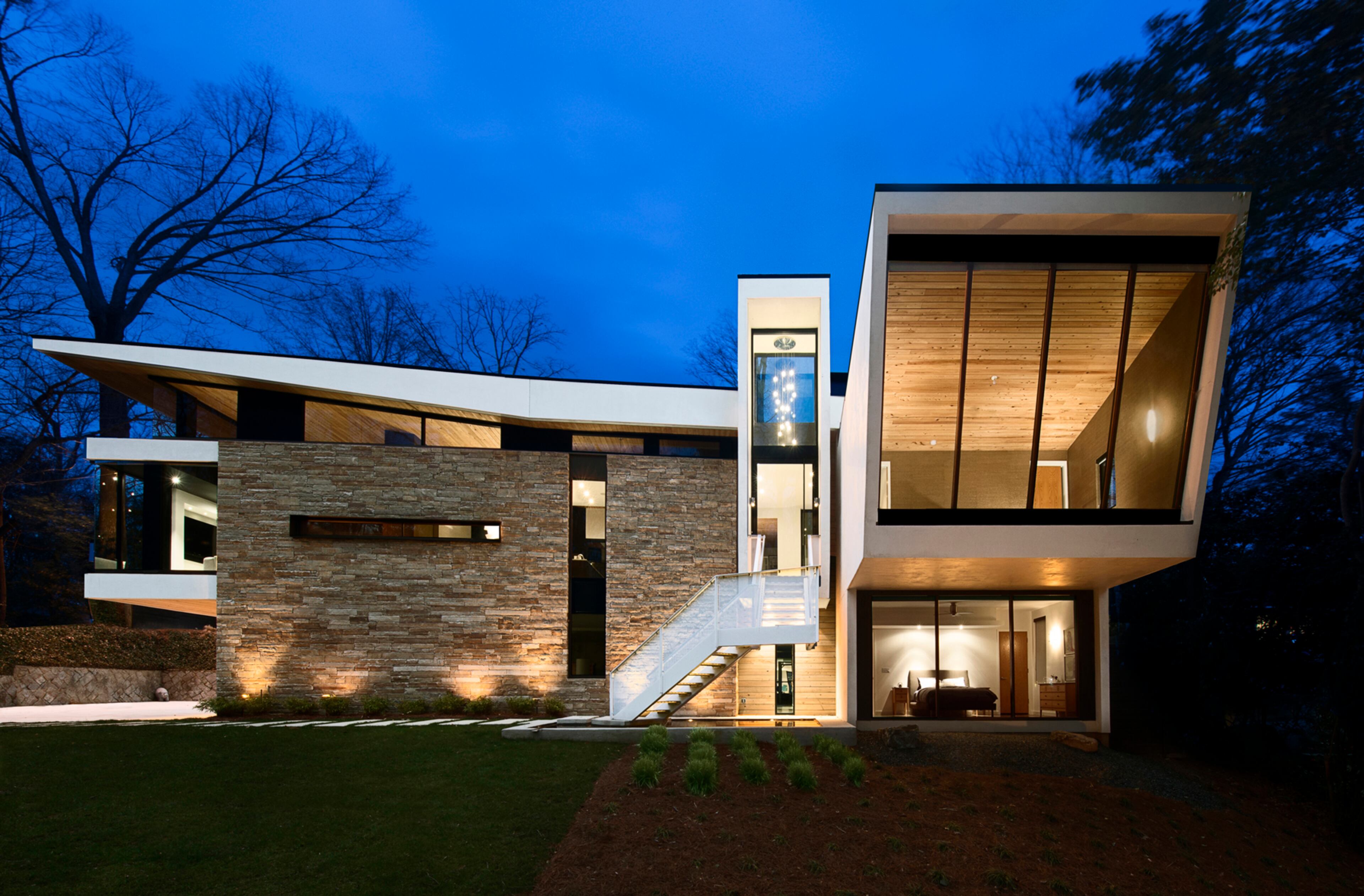 Candy and James Sarvis say that visiting the Modern Atlanta Home Tour had a major impact on deciding to build their Buckhead home, which replaced a dilapidated house from the 1950s. The T-shaped plan of the 3,900-square-foot house creates a private area in the back where there is an outdoor patio and pool. General contractor: Cablik Enterprises Architect: Staffan Svenson with Dencity