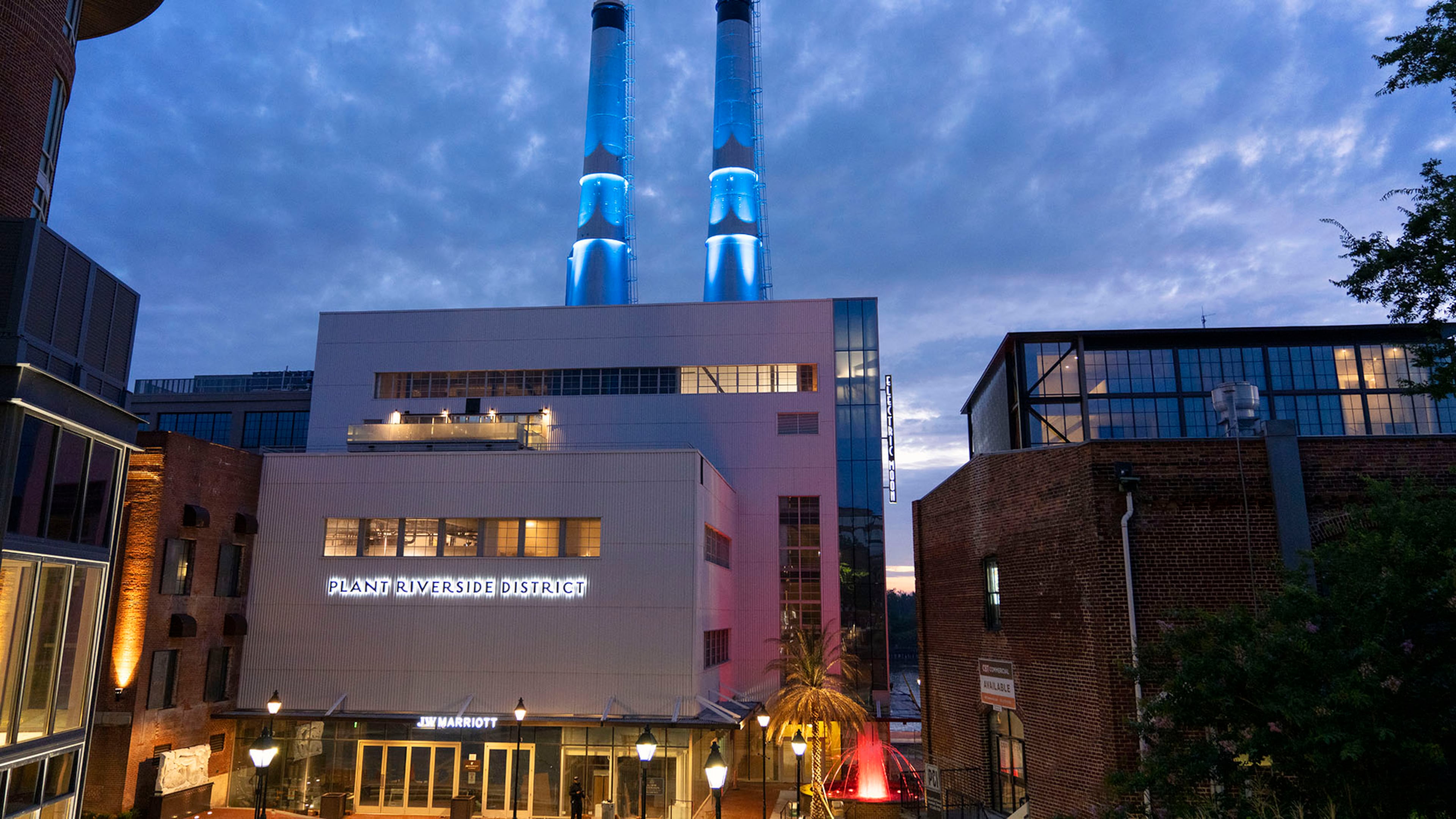 Illuminated 176-foot twin smokestacks light up the newly opened Plant Riverside District entertainment district in Savannah.
Courtesy of Plant Riverside District
