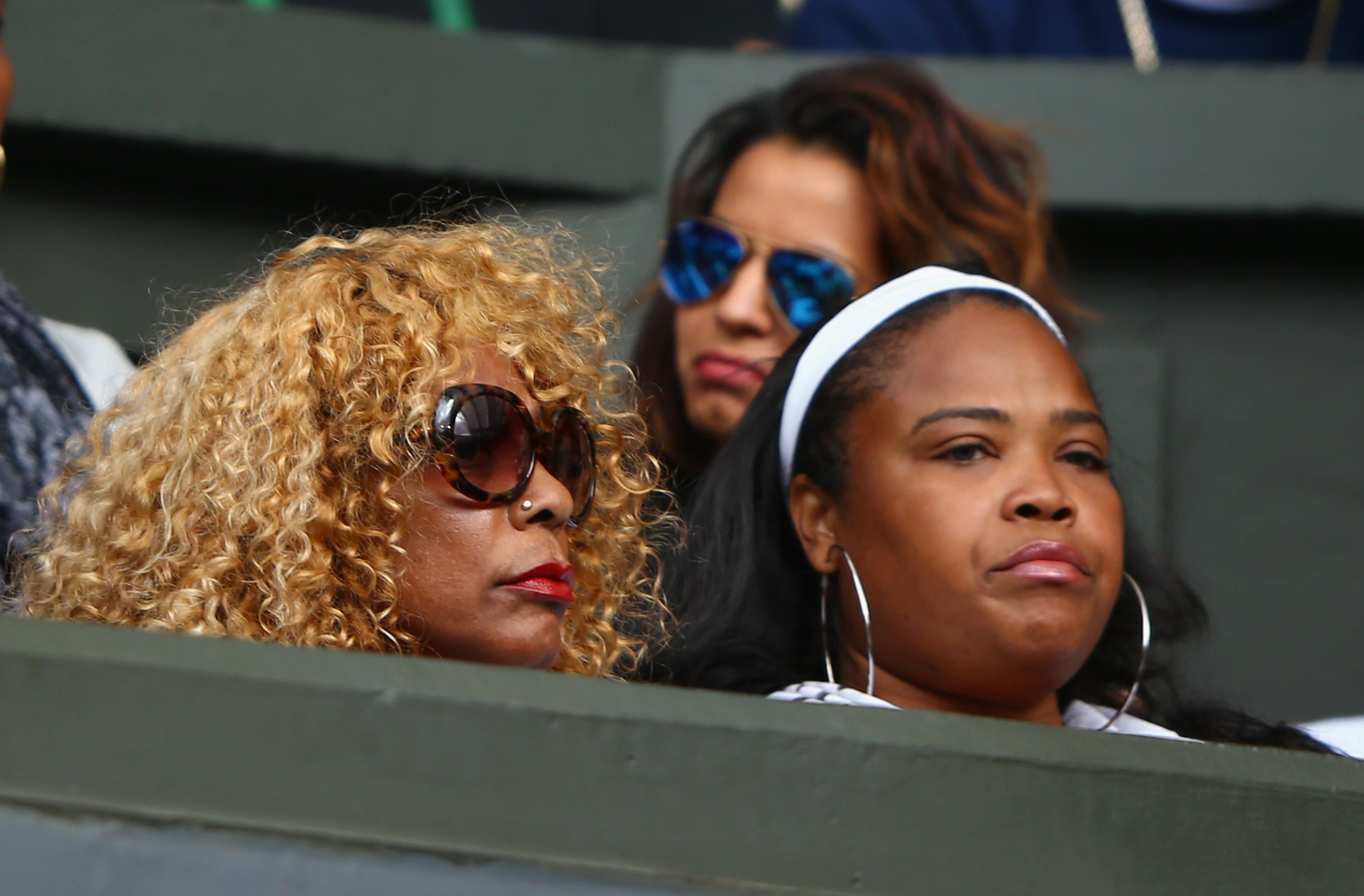 LONDON, ENGLAND - JULY 07: Half sister Isha Price and mother Oracene Price watch Serena Williams of the United States in her Ladies Singles Quarter Final match against Victoria Azarenka of Belarus during day eight of the Wimbledon Lawn Tennis Championships at the All England Lawn Tennis and Croquet Club on July 7, 2015 in London, England. (Photo by Ian Walton/Getty Images)