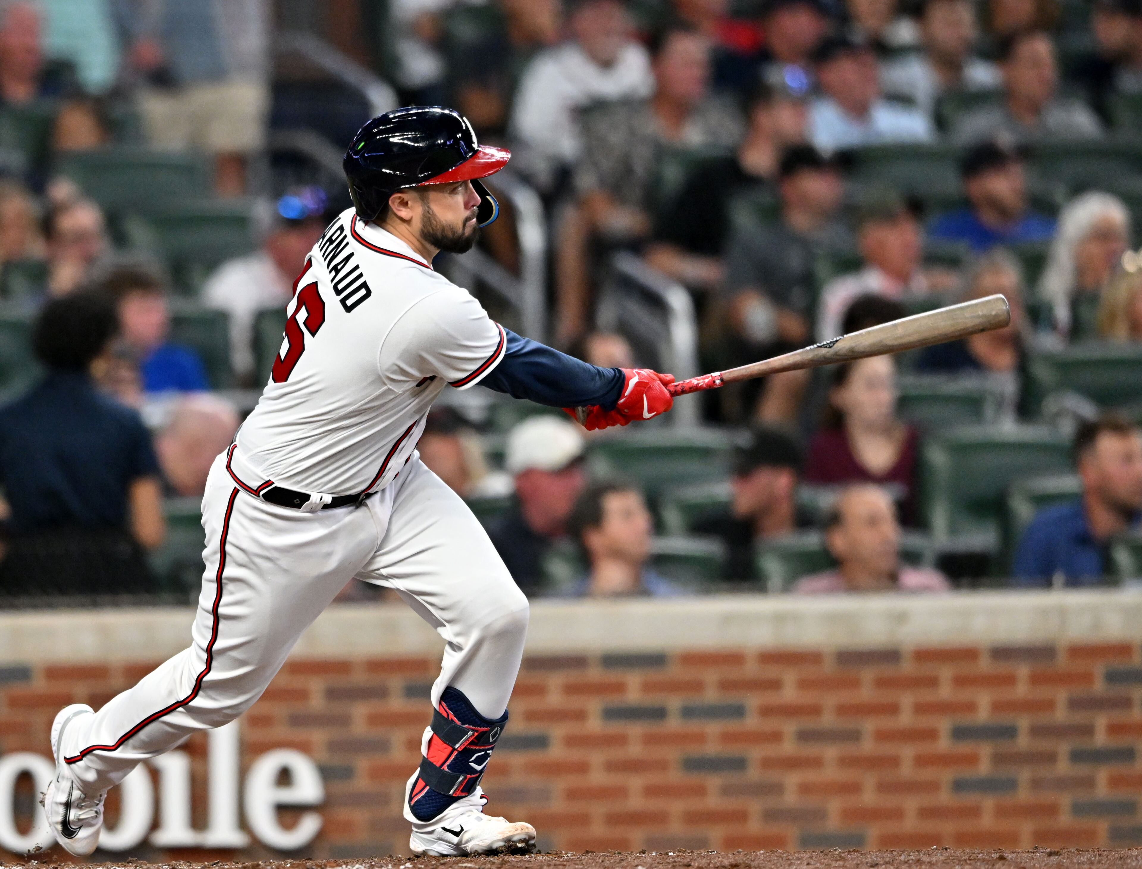 Atlanta Braves' catcher Travis d'Arnaud (16) hits a double during the fourth inning at Truist Park, Tuesday, September 19, 2023, in Atlanta. Atlanta Braves won 9-3 over Philadelphia Phillies. (Hyosub Shin / Hyosub.Shin@ajc.com)
