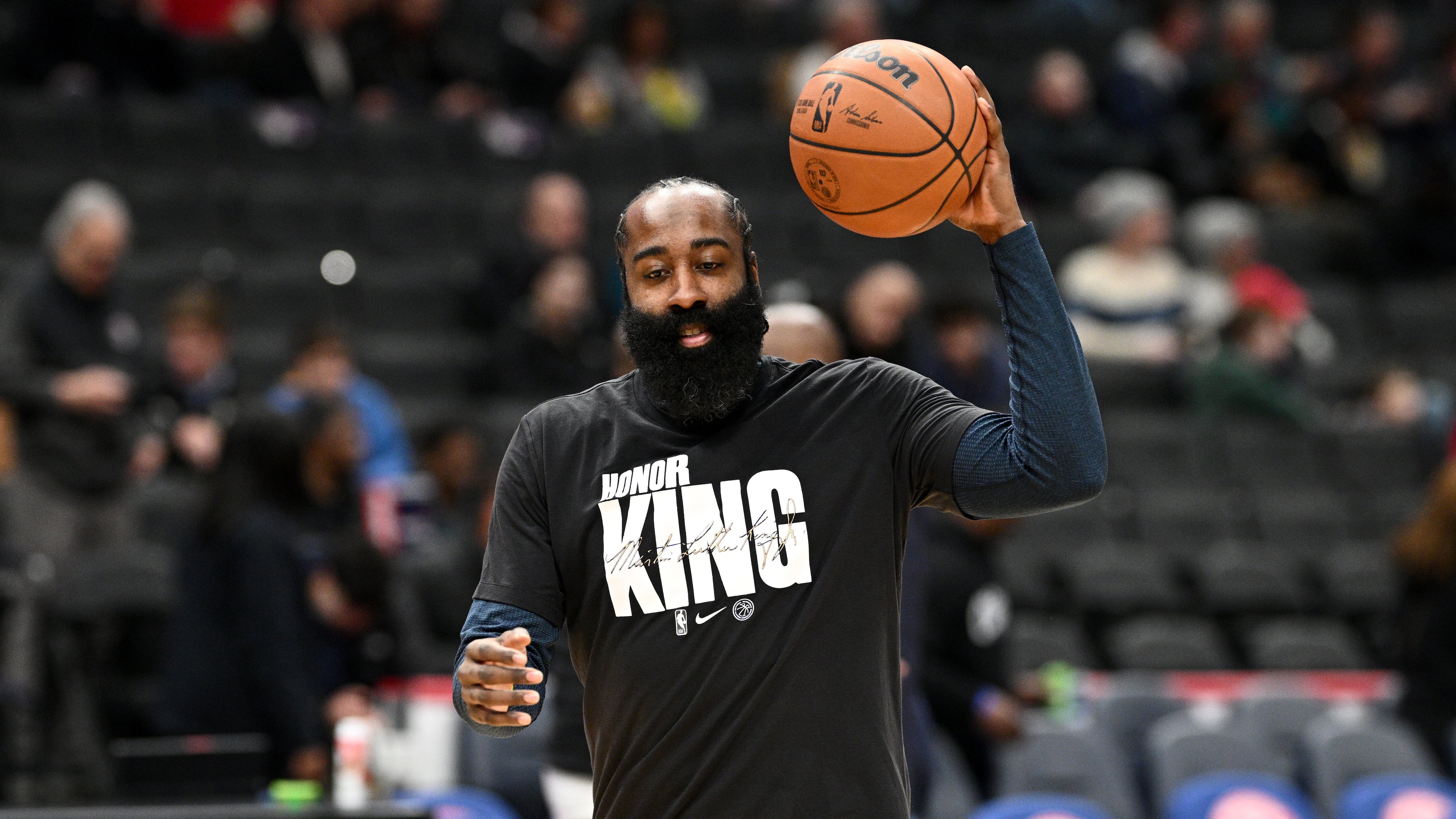 Los Angeles Clippers guard James Harden warms up while wearing a shirt paying tribute to Martin Luther King Jr. before of an NBA basketball game against the Washington Wizards, Monday, Jan. 19, 2026, in Washington. (AP Photo/Nick Wass)