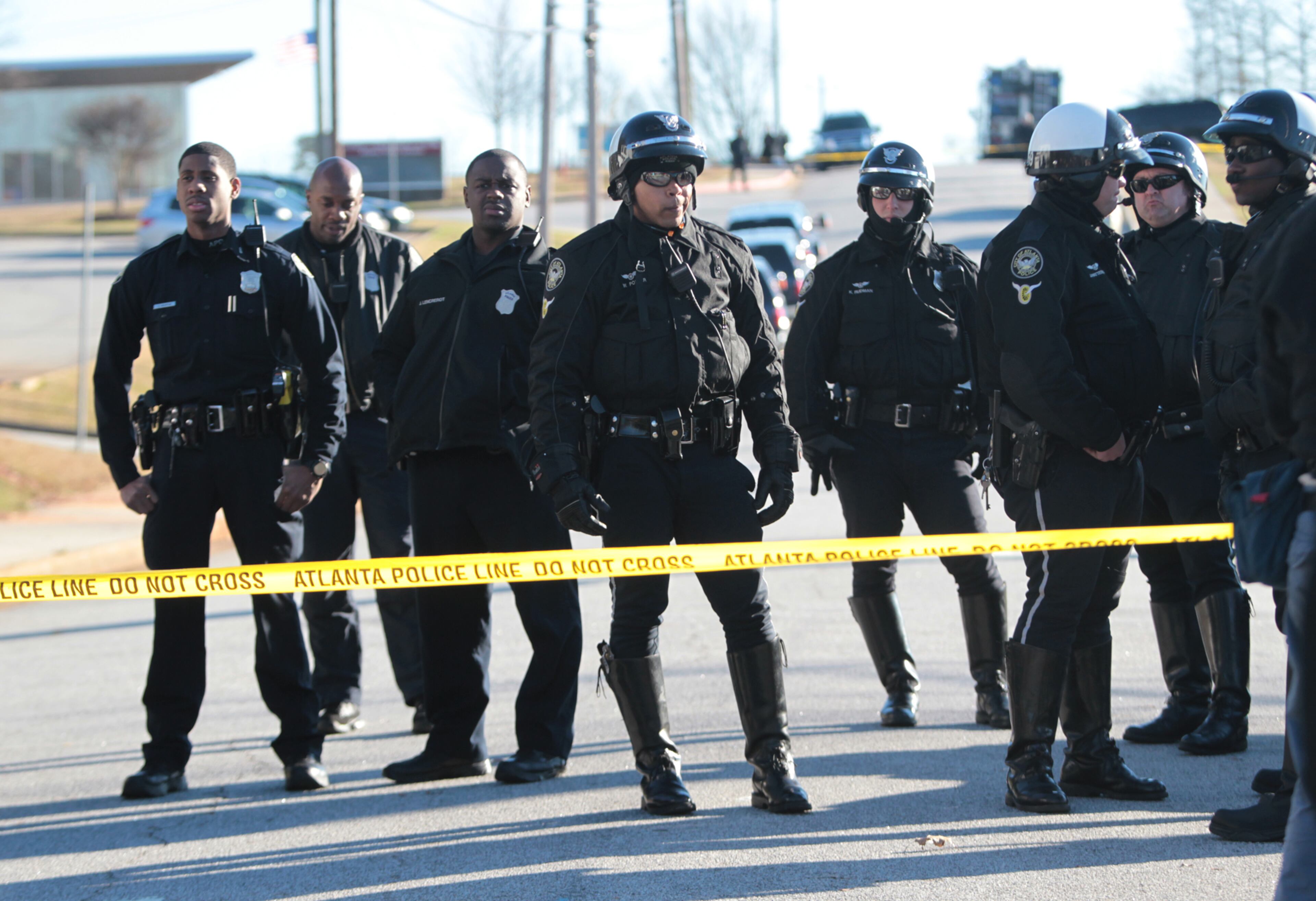 Atlanta police officers work the scene at the school.