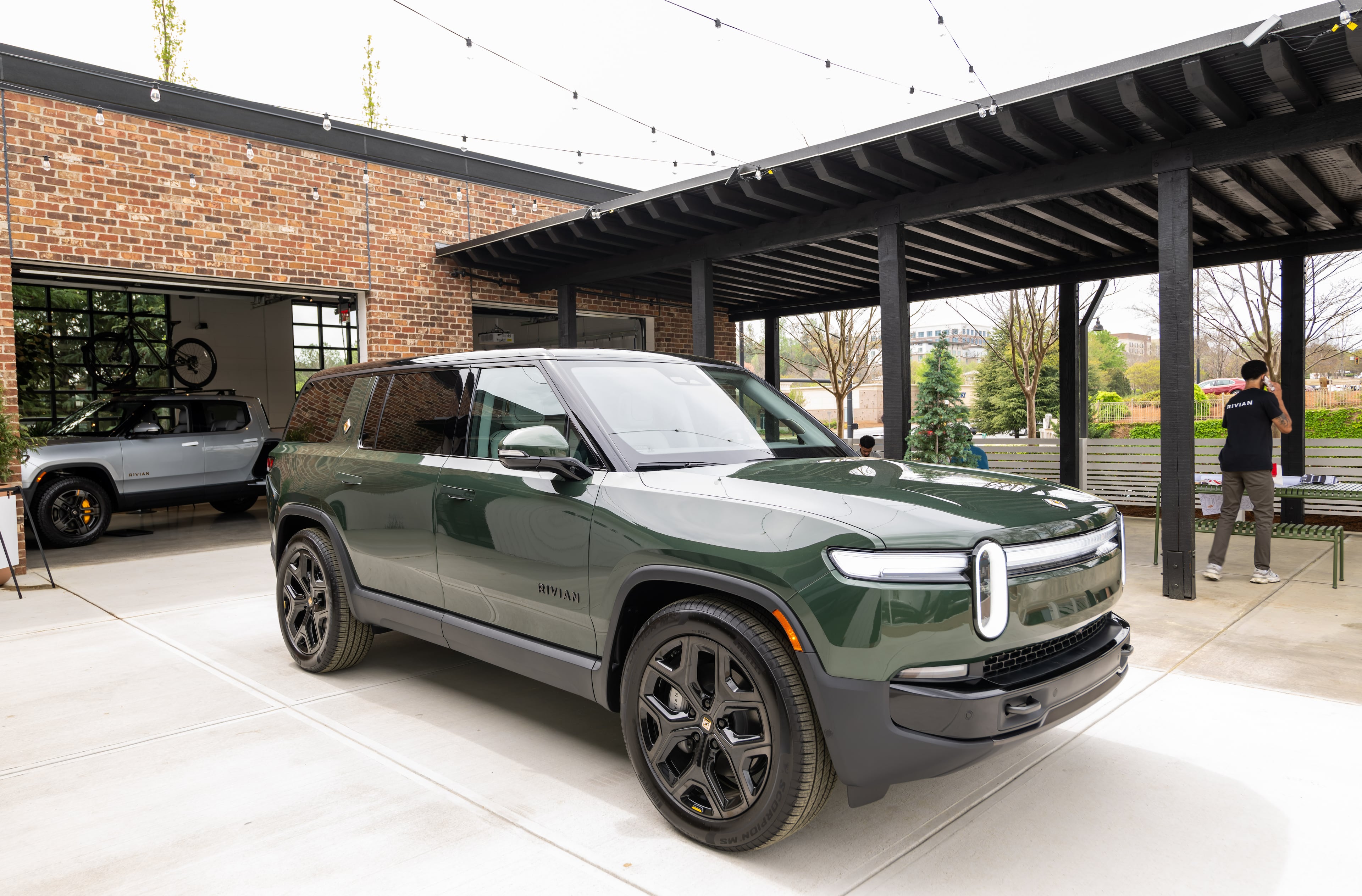 250404 Alpharetta, GA — A Rivian R1S is parked in the courtyard of the new Rivian “space” at Avalon in Alpharetta on Friday, April 4, 2025.
(Bita Honarvar for The Atlanta Journal-Constitution)