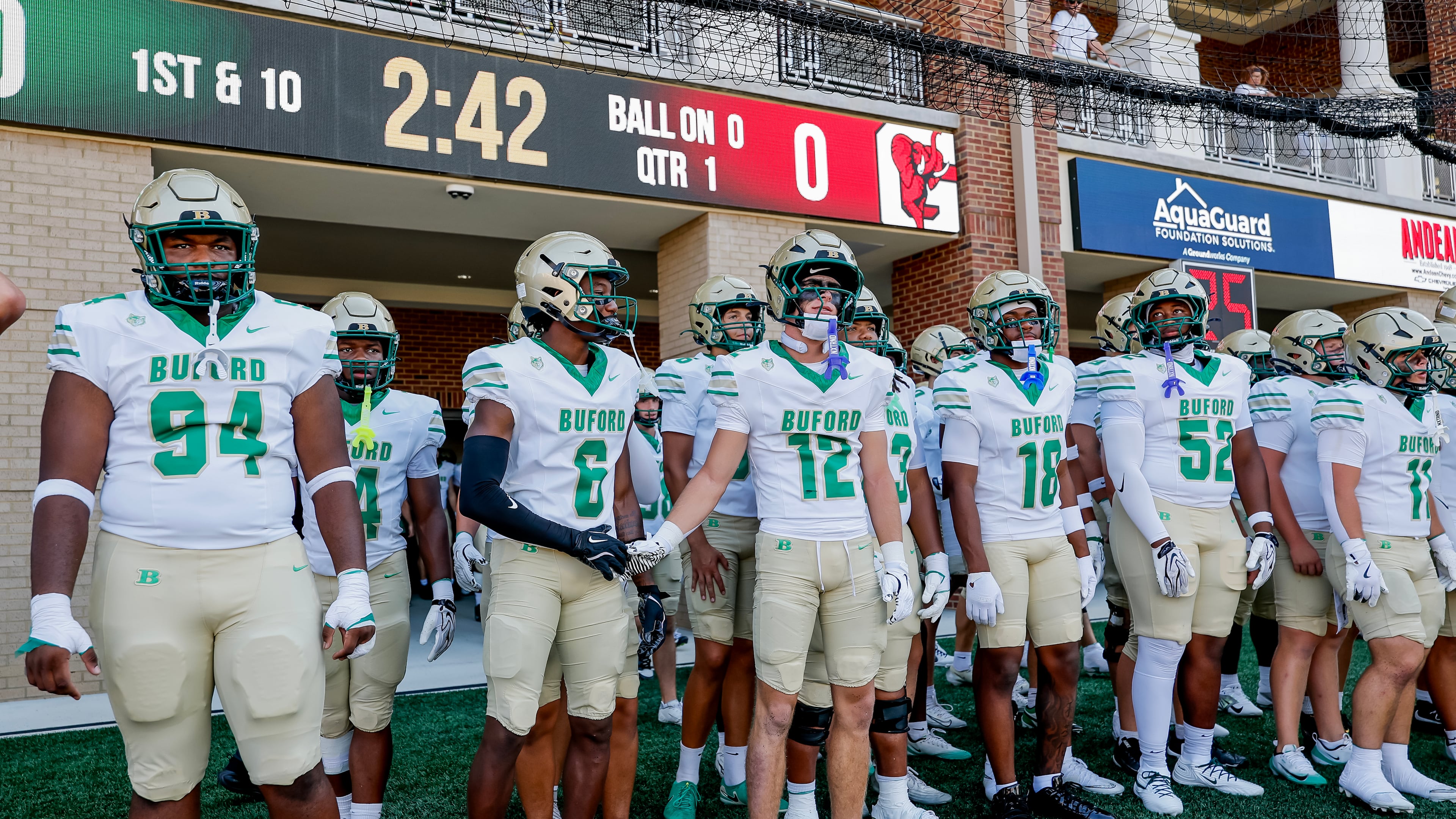 Buford readies to take the field before the first half of a high school football game between Buford and Gainesville, Saturday, Aug. 22, 2026, in Buford, GA. (Erik S. Lesser for the AJC)