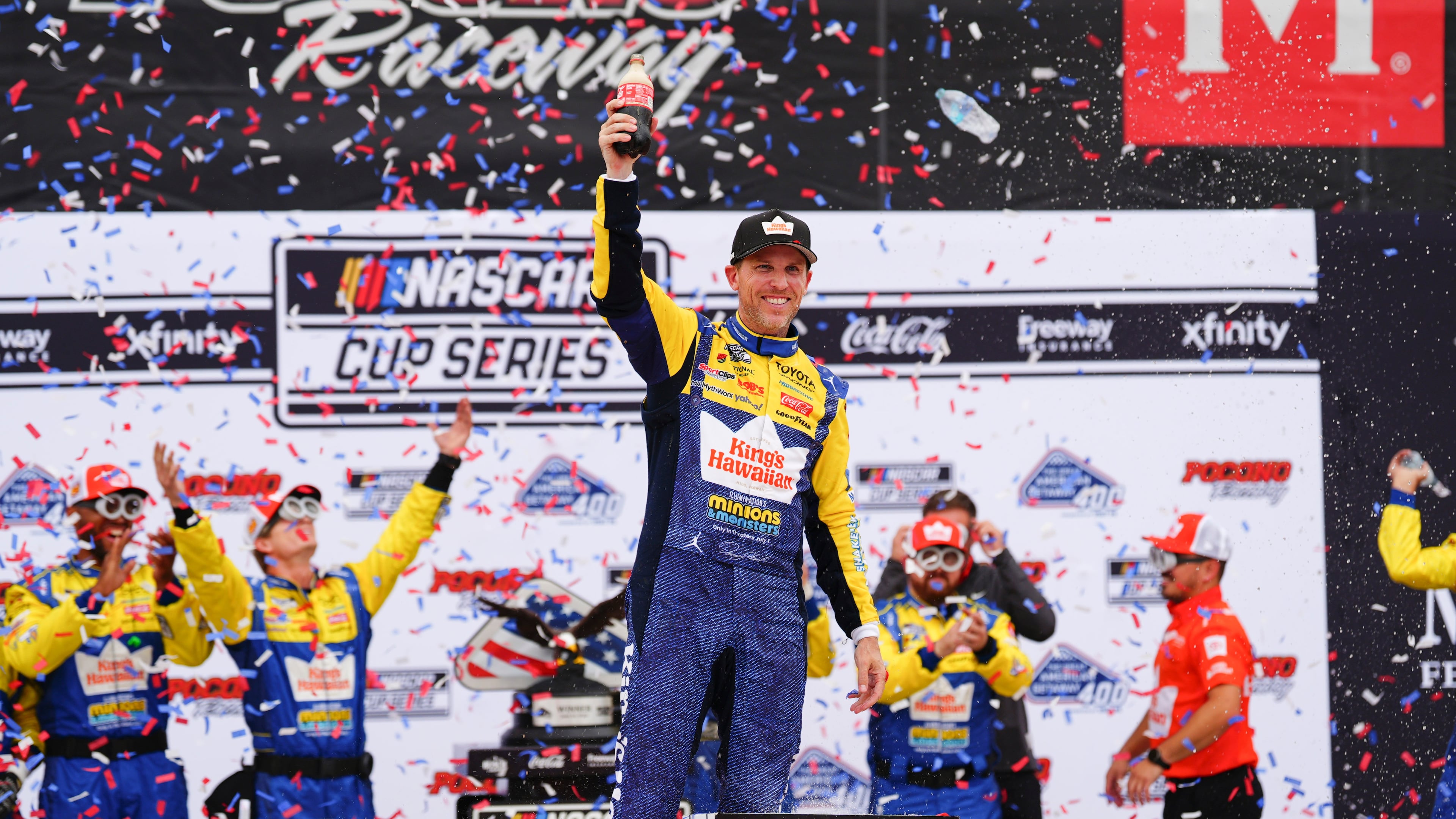 Denny Hamlin celebrates in Victory Lane after winning a NASCAR Cup Series auto race at Pocono Raceway, Sunday, June 14, 2026, in Long Pond, Pa. (AP Photo/Derik Hamilton)