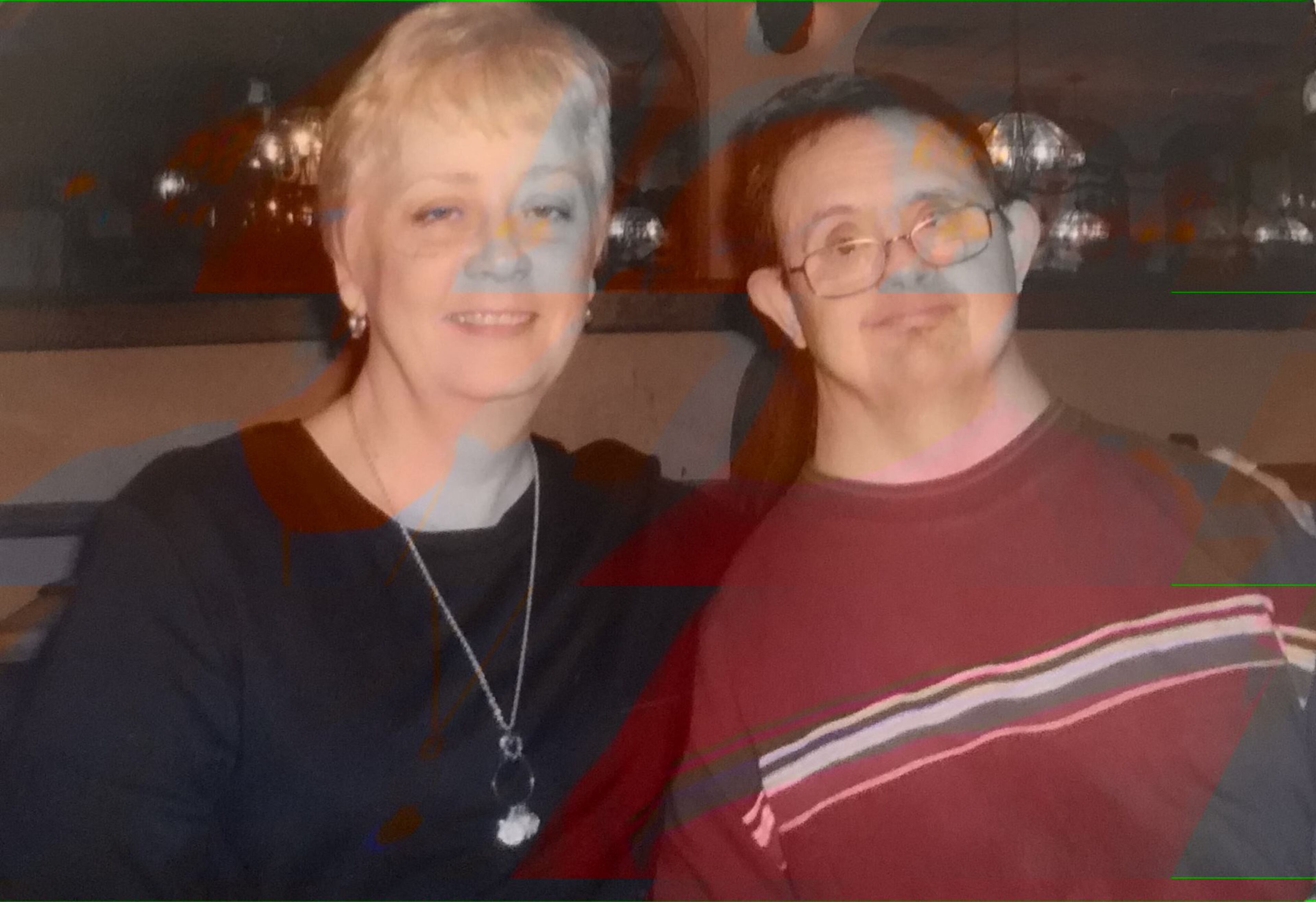 Jones promised her aunt that she would care for her cousin Benton, who has Down syndrome. He moved in with her and was always by her side starting in 2004 (above in 2008).