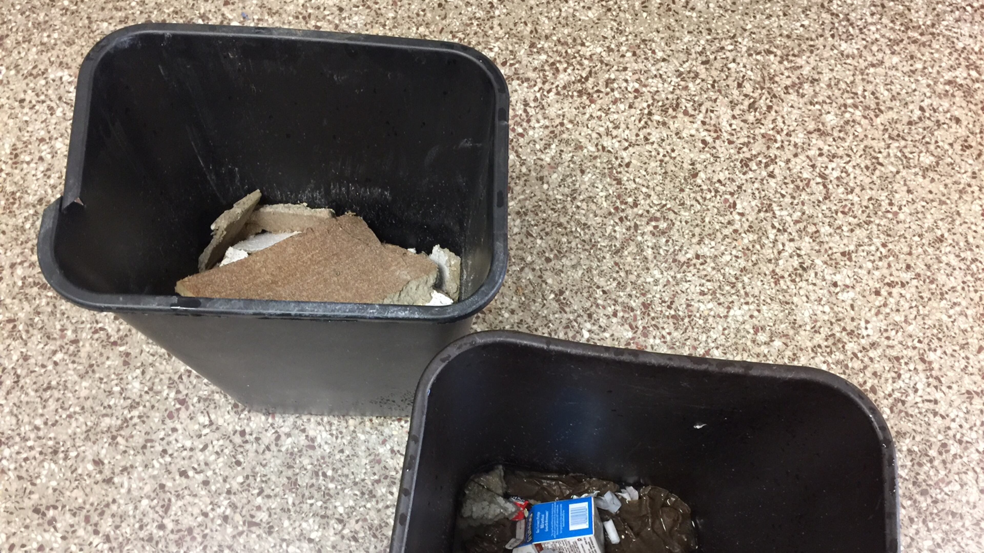 Garbage cans at Dresden Elementary School were moved to catch water from roof leaks. (Handout Photo)