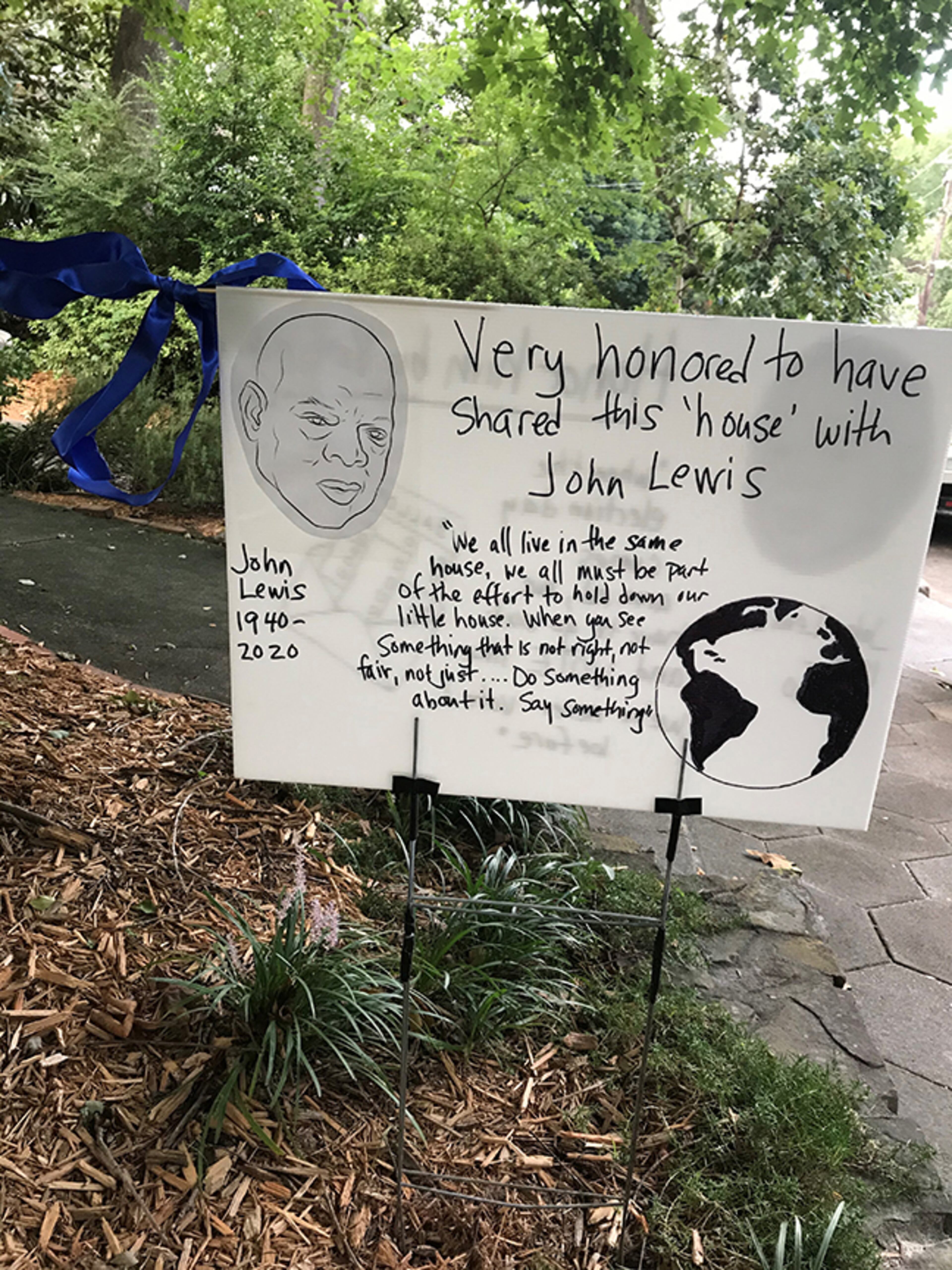 Our tribute sign/ribbon. - The Slutsker family on Candler Park Drive. Very proud/grateful and now sad District 5 residents.