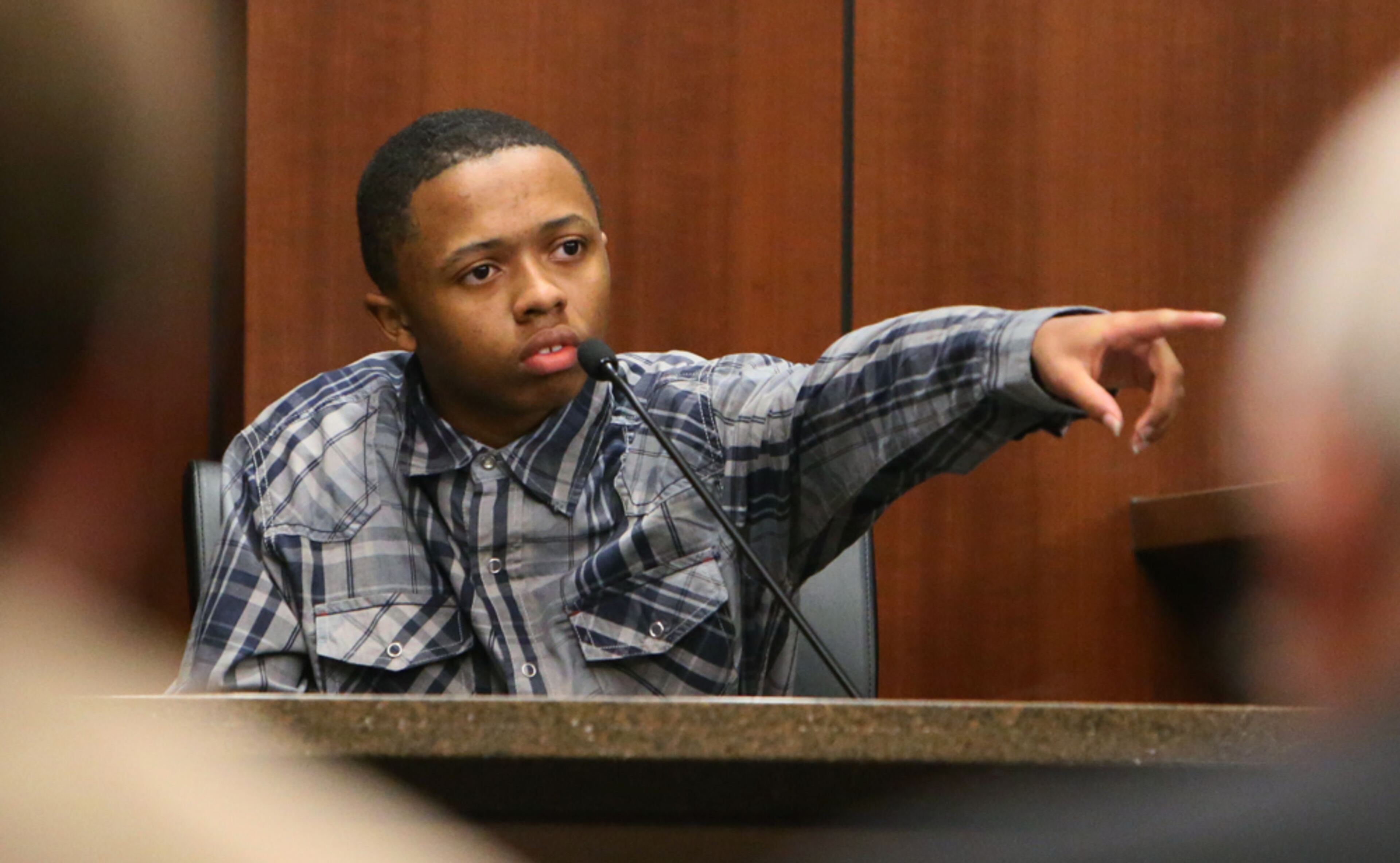 Aug 22, 2013 - Atlanta - Dominique Lang points out Defendant De'Marquise Elkins as the shooter. Day 3 of testimony continues in the Brunswick baby killing trial. Dominique Lang, alleged 15 year old accomplice in the murder and his cousin, Joe Lang, took the stand as the prosecution continued its case. BOB ANDRES / BANDRES@AJC.COM BABY IN STROLLER SLAIN