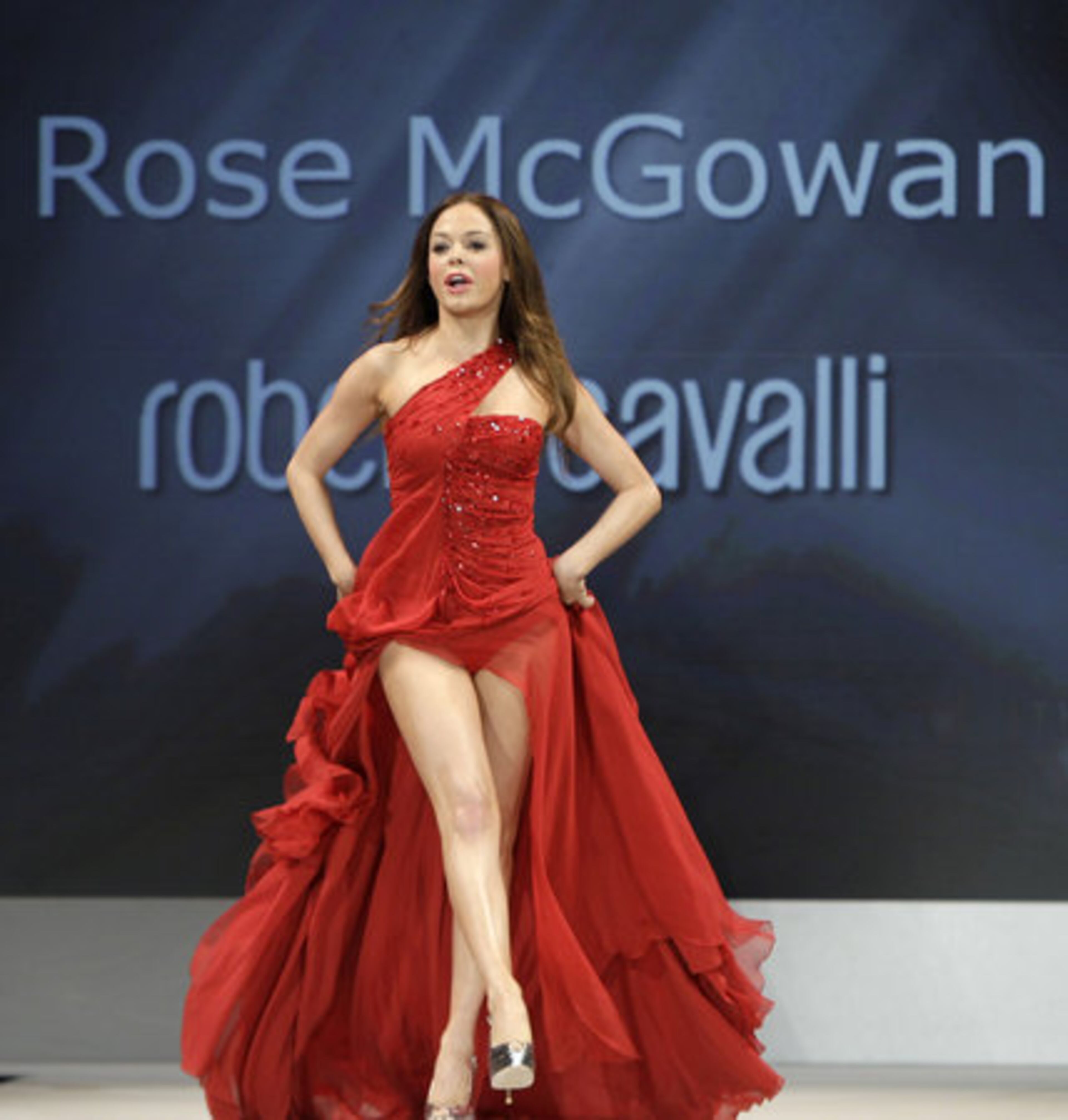 Actress and singer Rose McGowan bares her legs in a Roberto Cavalli gown.