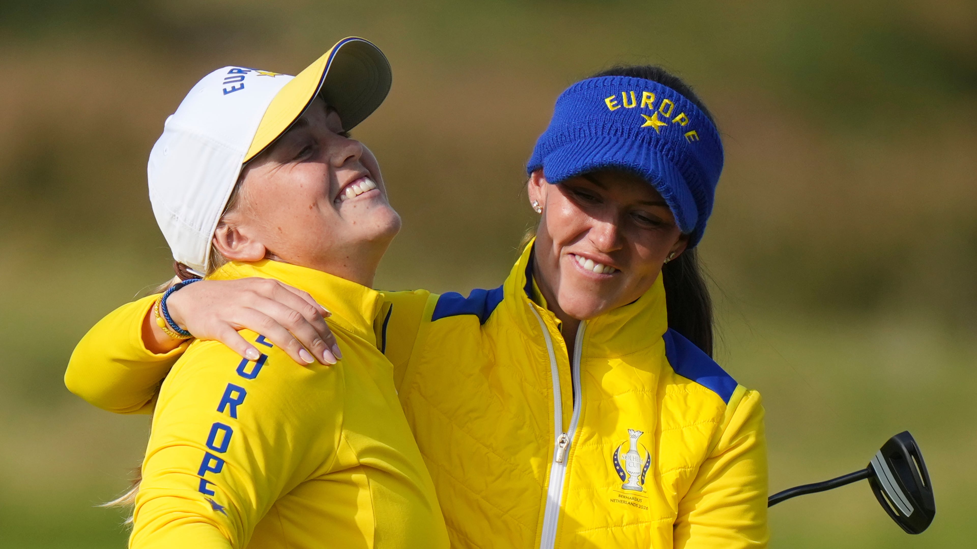 Maja Stark, left, of Europe celebrates with teammate Linn Grant on the 16th green during the Solheim Cup at the Bernardus Golf course in Den Bosch, Netherlands, Saturday, Sept. 12, 2026. (AP Photo/Alastair Grant)