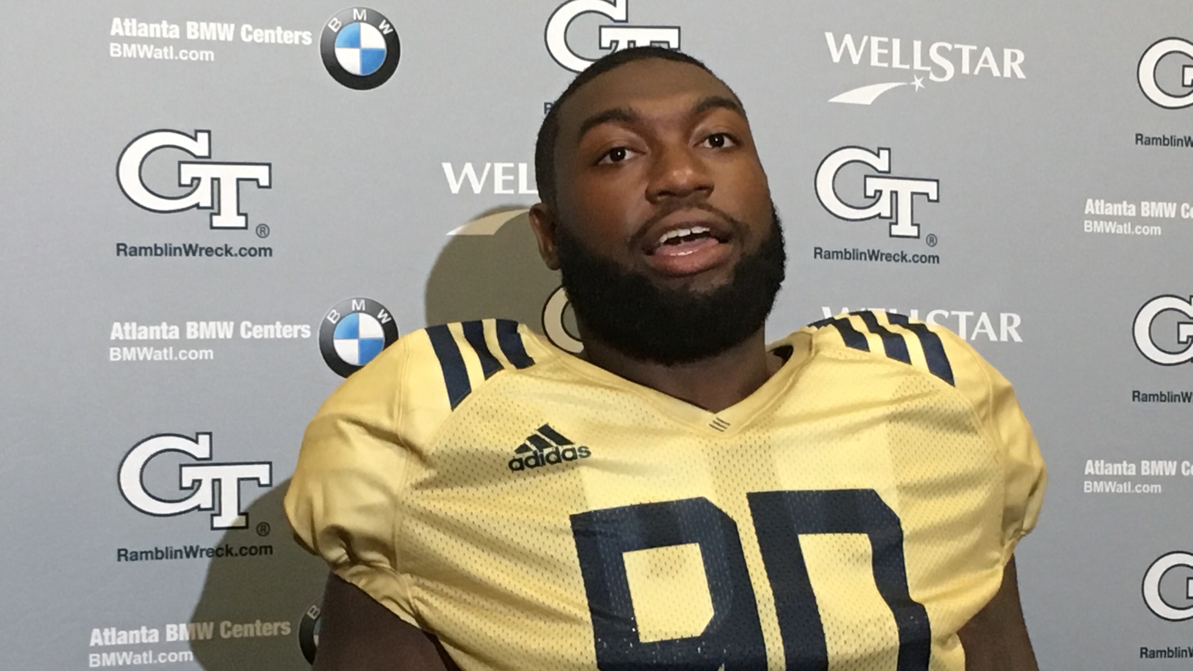 Georgia Tech defensive tackle Chris Martin speaks with media following practice August 26, 2019. Martin normally wears No. 96, but was chosen to wear No. 90, the number of the late Brandon Adams, for Tech's season opener against Clemson. (AJC photo by Ken Sugiura)