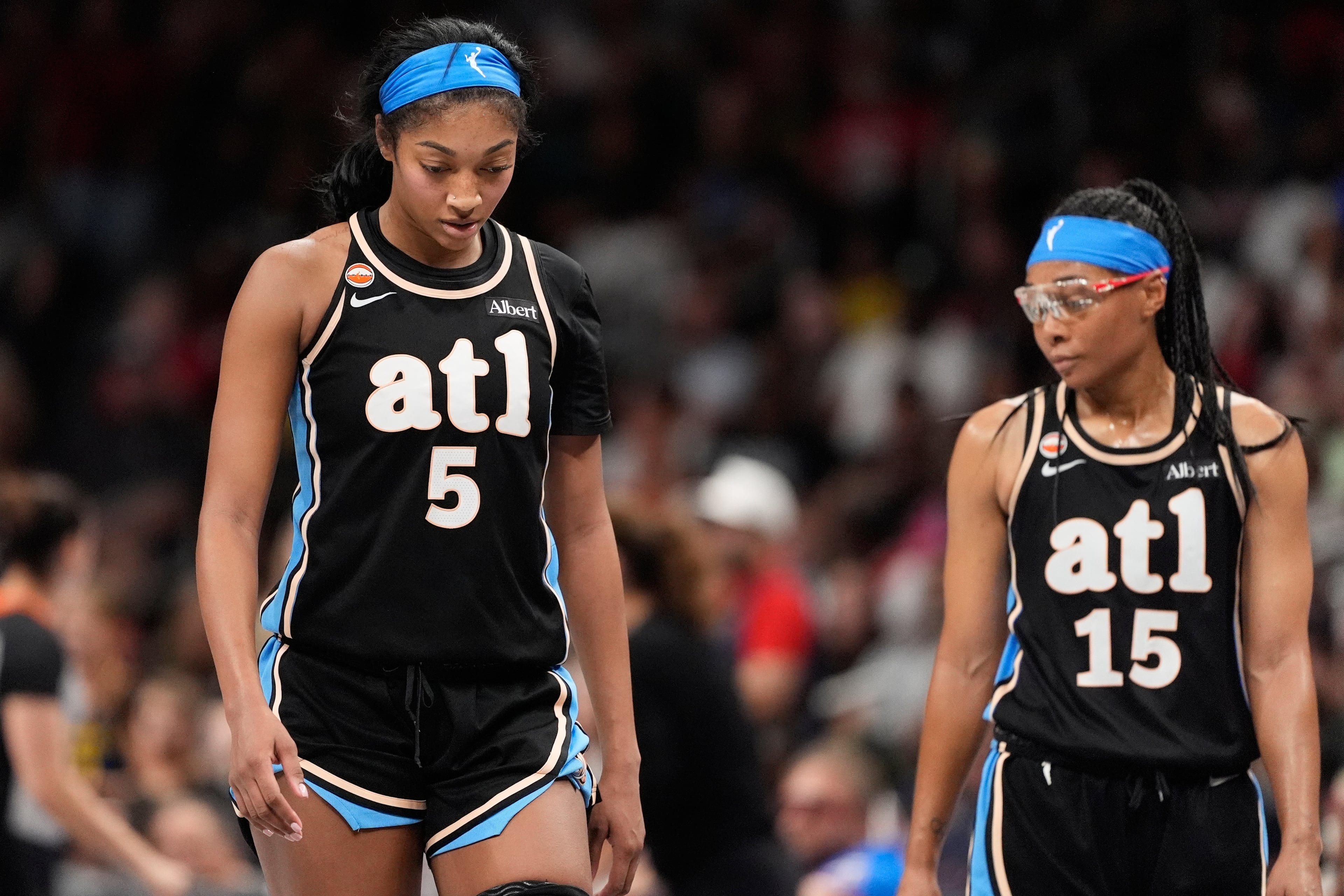 The Dream's Angel Reese (left) and Allisha Gray, during the second half of Sunday's overtime loss to the Fever. (Brynn Anderson/AP)