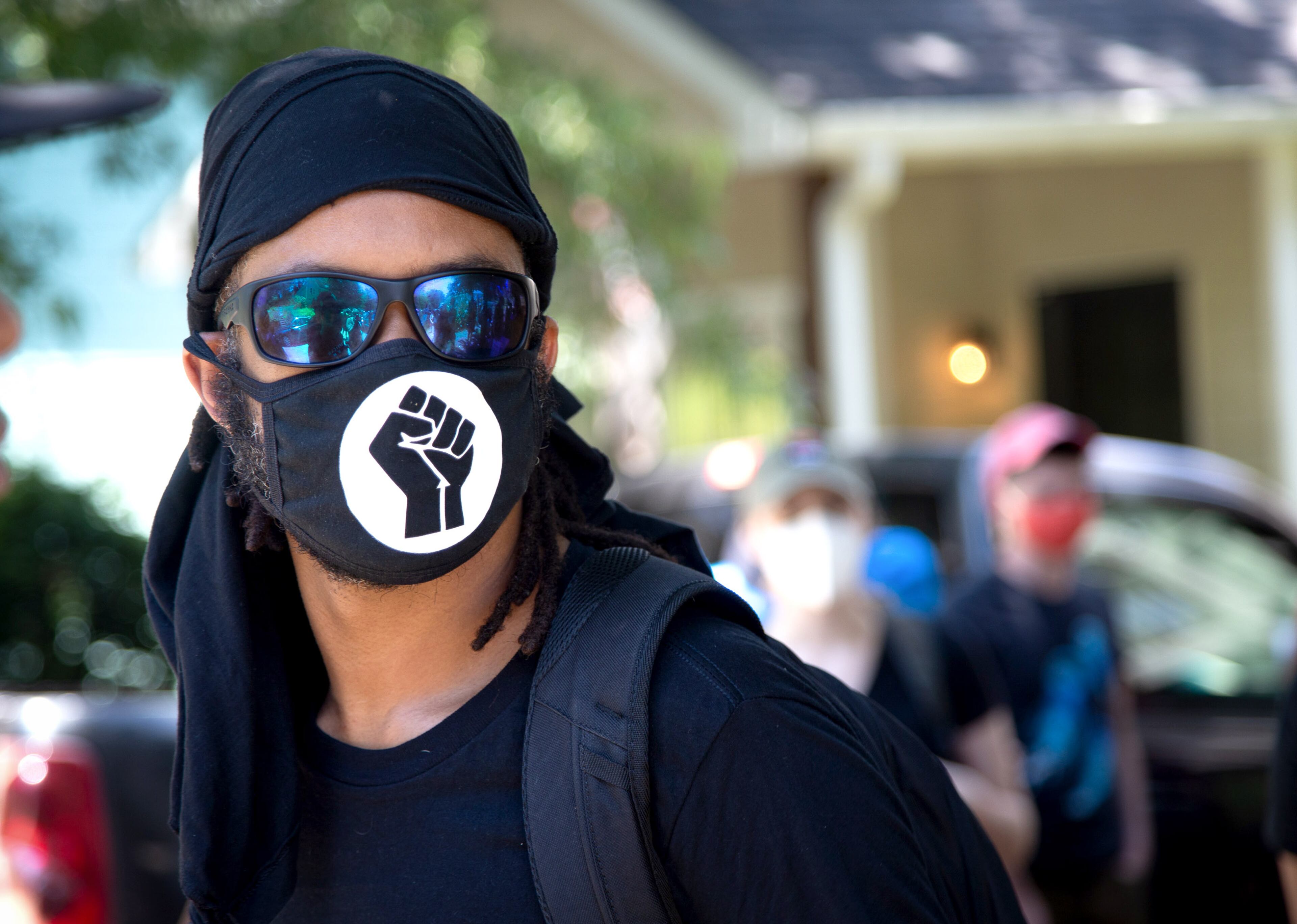 Protesters get ready before heading to the Wendy's on University Avenue during the 'Take Back the Wendy's' March & Rally in Atlanta on Saturday, July 11, 2020. The march started at the Community Movement Builders community house and ended at the Wendy's. STEVE SCHAEFER FOR THE ATLANTA JOURNAL-CONSTITUTION