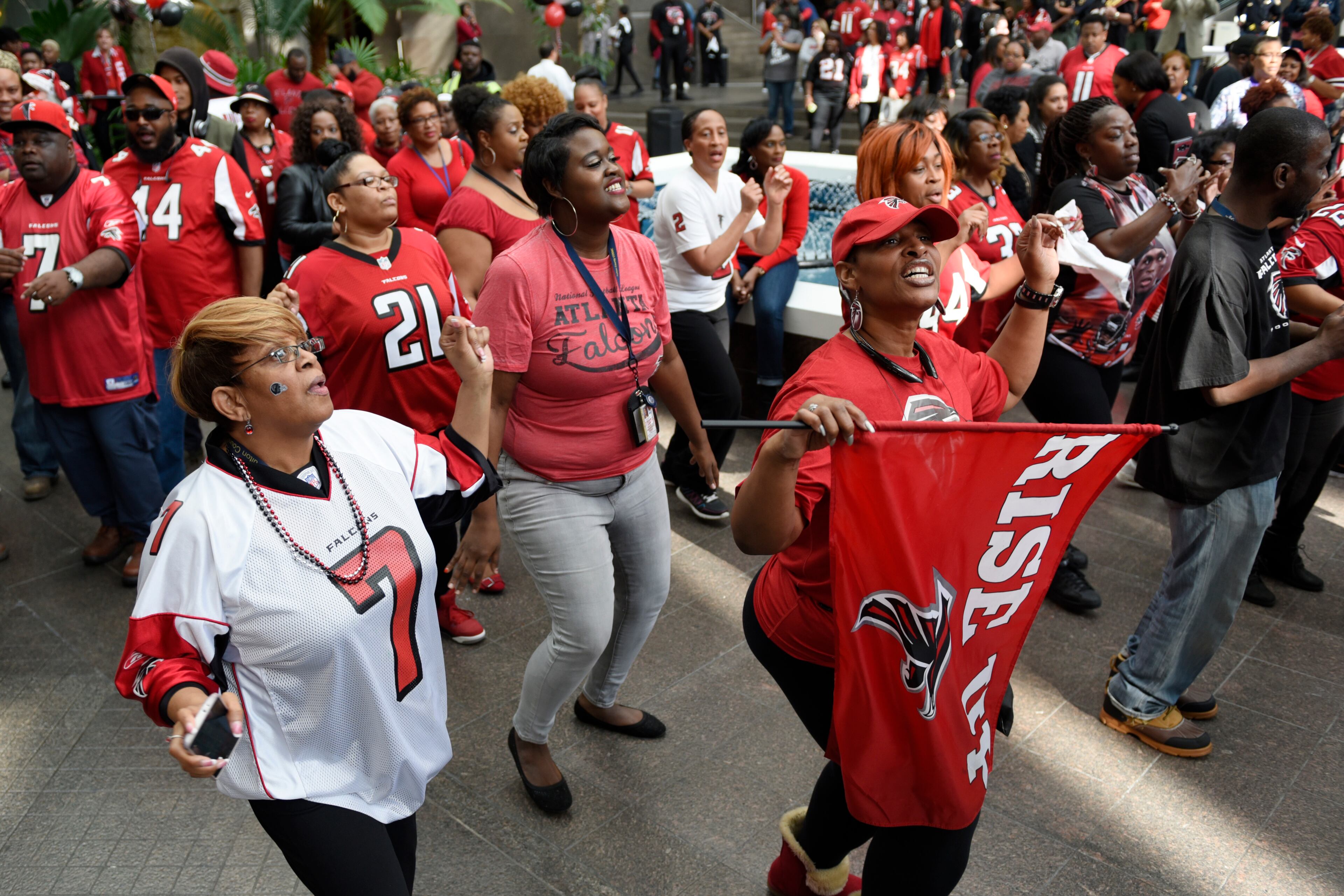 January 20, 2017, Atlanta - Fans dance during a pep rally for the upcoming NFC Championship game against the Packers in Atlanta, Georgia, on Friday, January 20, 2017. (DAVID BARNES / DAVID.BARNES@AJC.COM)