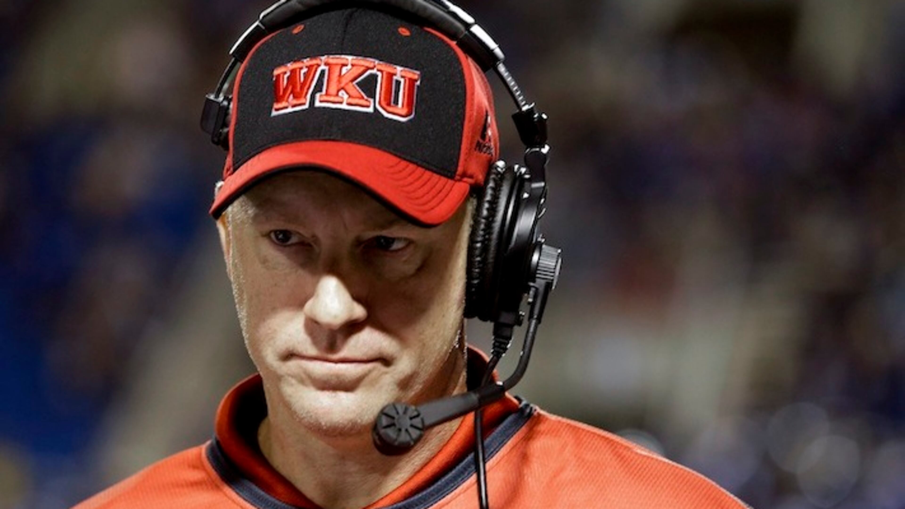 In this Sept. 13, 2014 file photo, Western Kentucky head coach Jeff Brohm watches from the sideline during the fourth quarter of an an NCAA college football game against Middle Tennessee in Murfreesboro, Tenn. Brohm is most likely to thrive because of the combination of his track record (30-10 in three seasons at Western Kentucky) and the low bar to clear at Purdue, where the past nine seasons have produced two bowl appearances and one winning final record. (AP Photo/Mark Humphrey, File)