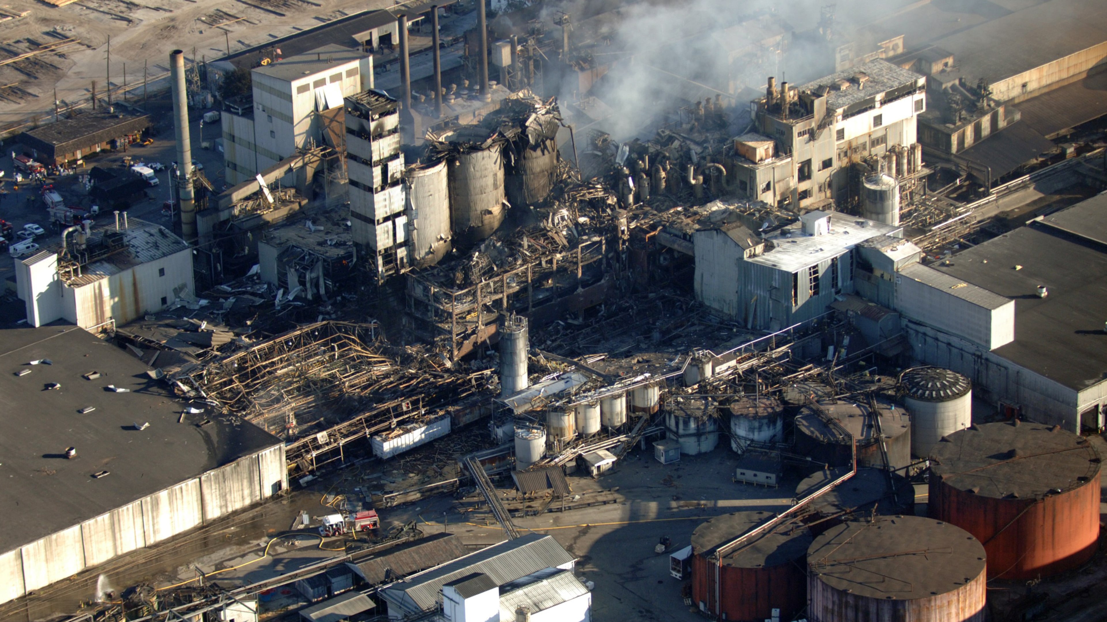 Firefighters fight a blaze Feb. 8, 2008, at the Imperial Sugar Company after an explosion Thursday night ripped apart the plant on the Savannah River in Port Wentworth, Ga. The blast killed 14 people and injured dozens more. (AP Photo/Stephen Morton)