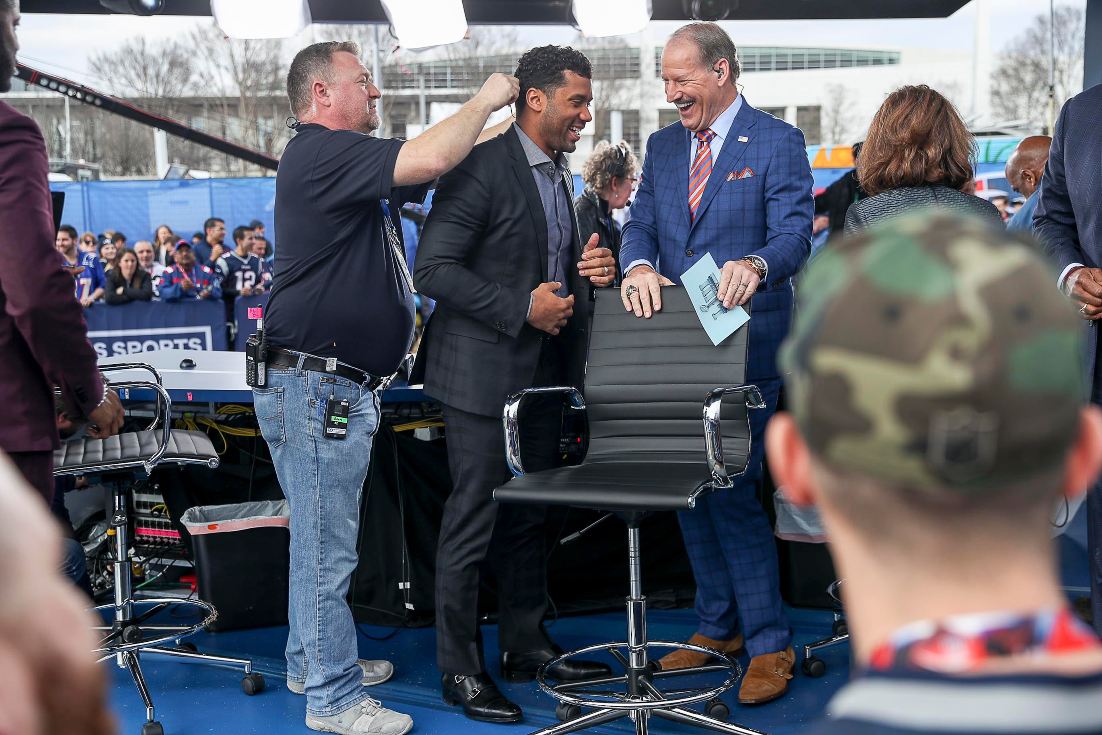 Seattle Seahawks quarterback Russell Wilson (center) shares a laugh after taping a live segment of the CBS Sports Super Bowl Today Pre-Game Show at the Home Depot Backyard Lot near Mercedes-Benz Stadium before the start of Super Bowl LIII on Sunday, February 3, 2019. (ALYSSA POINTER/ALYSSA.POINTER@AJC.COM)