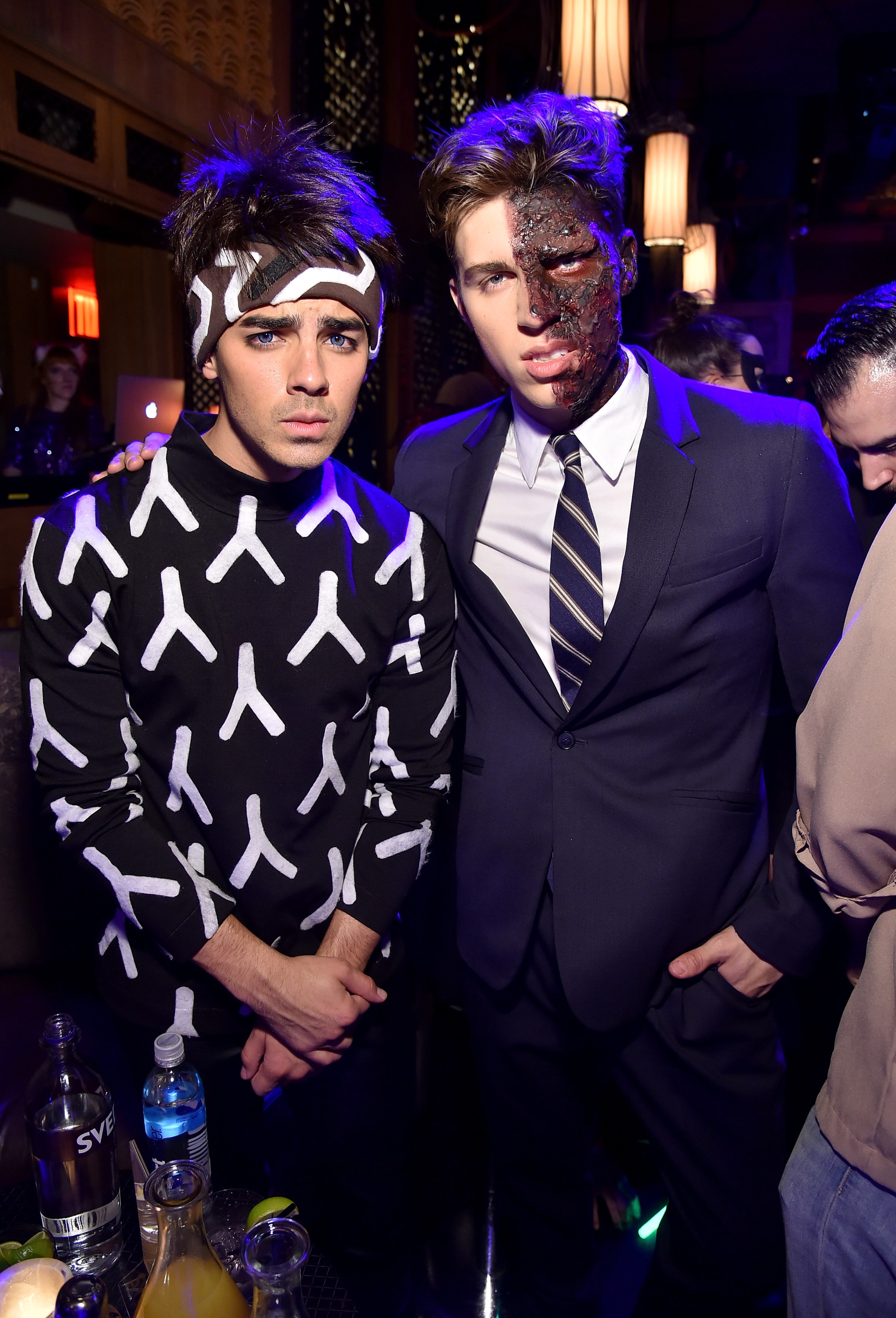 NEW YORK, NY - OCTOBER 31: Joe Jonas and Nolan Gerard Funk attend Moto X presents Heidi Klum's 15th Annual Halloween Party sponsored by SVEDKA Vodka at TAO Downtown on October 31, 2014 in New York City. (Photo by Mike Coppola/Getty Images for Heidi Klum)