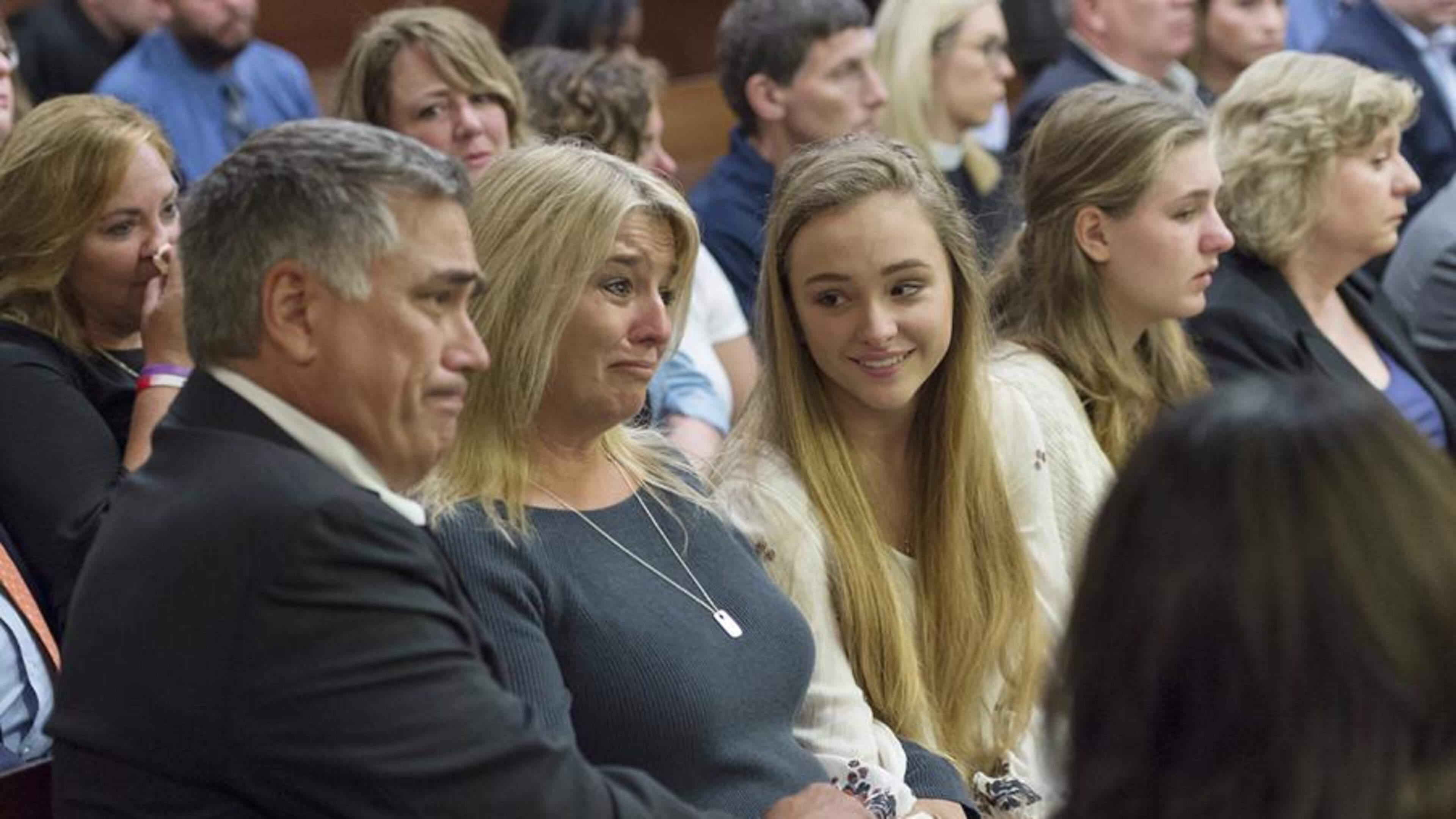 The family of Natalie Henderson reacts to the judge’s decision at the conclusion of the sentencing of Jeffrey Hazelwood on Wednesday(DAVID BARNES / DAVID.BARNES@AJC.COM)