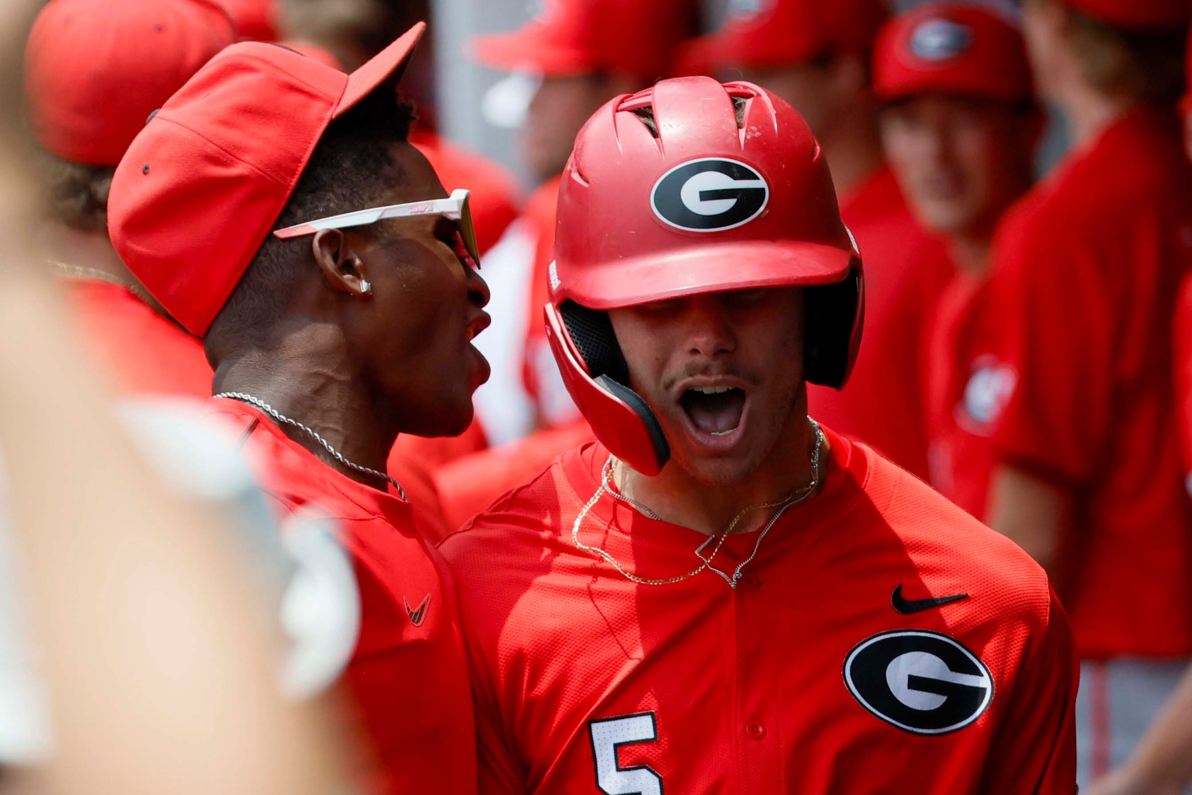 Georgia infielder Christian Adams (5), right, celebrates celebrates with teammates after hitting a two-run home run during the second inning against Oklahoma State in their NCAA Regional game at Foley Field, Sunday, June 1, 2025, in Athens, Ga.
(Miguel Martinez/ AJC)