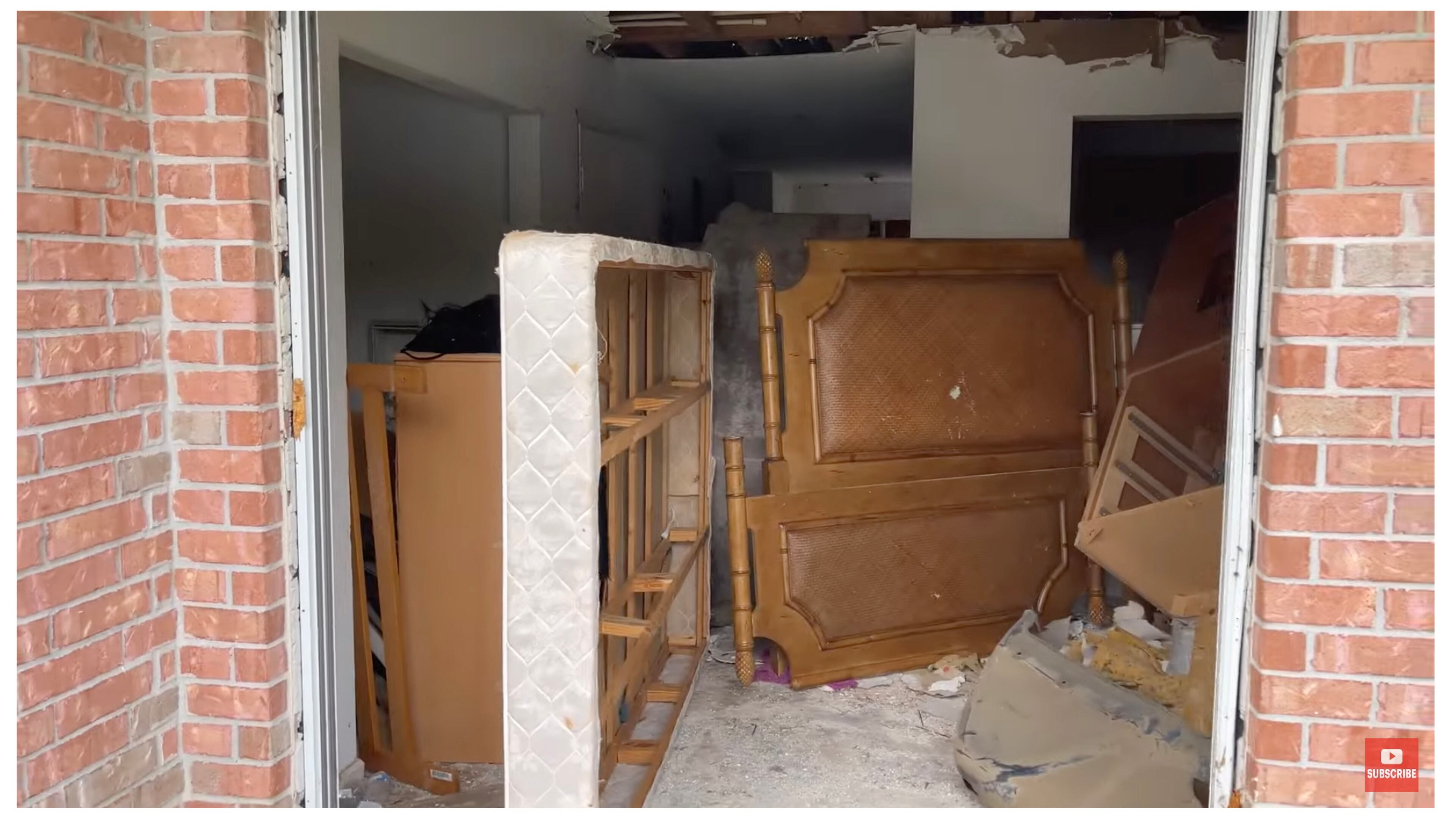 Police used this and other images from an online video posted earlier this year as evidence to launch a code enforcement blitz at Pinebrooke Apartments near RIverdale. Vacant units were open for anyone to enter and stuffed with discarded furniture. (Miko Worldwide / YouTube)