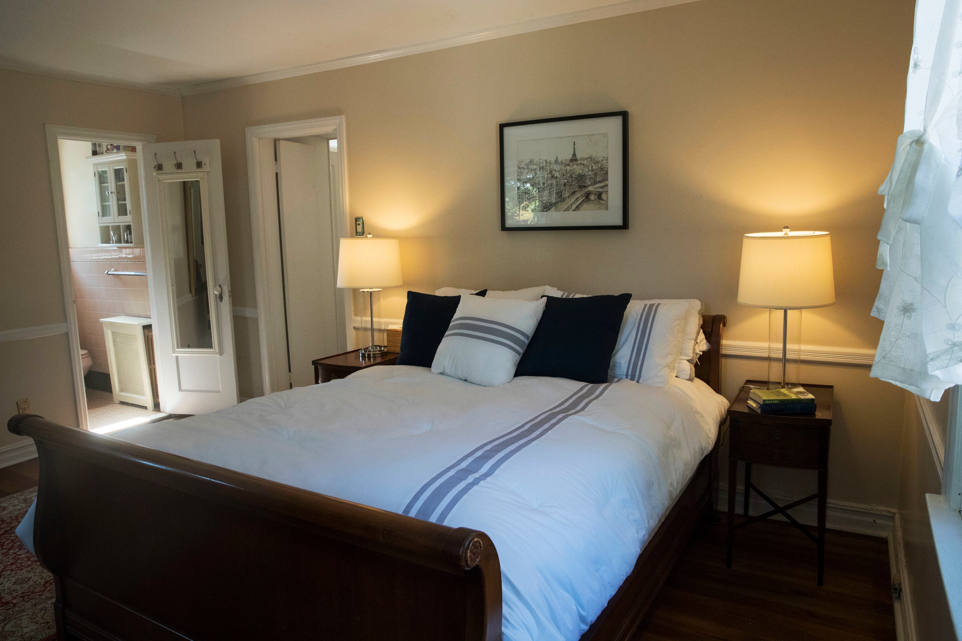 This Tuesday, Oct. 18, 2016 photo, shows the master bedroom in the house where Republican presidential candidate Donald Trump spent his early childhood in the Jamaica Estates neighborhood of the Queens borough of New York. Trump's first boyhood home in New York City is going on the auction block with an opening bid of $849,000. (AP Photo/Mary Altaffer)