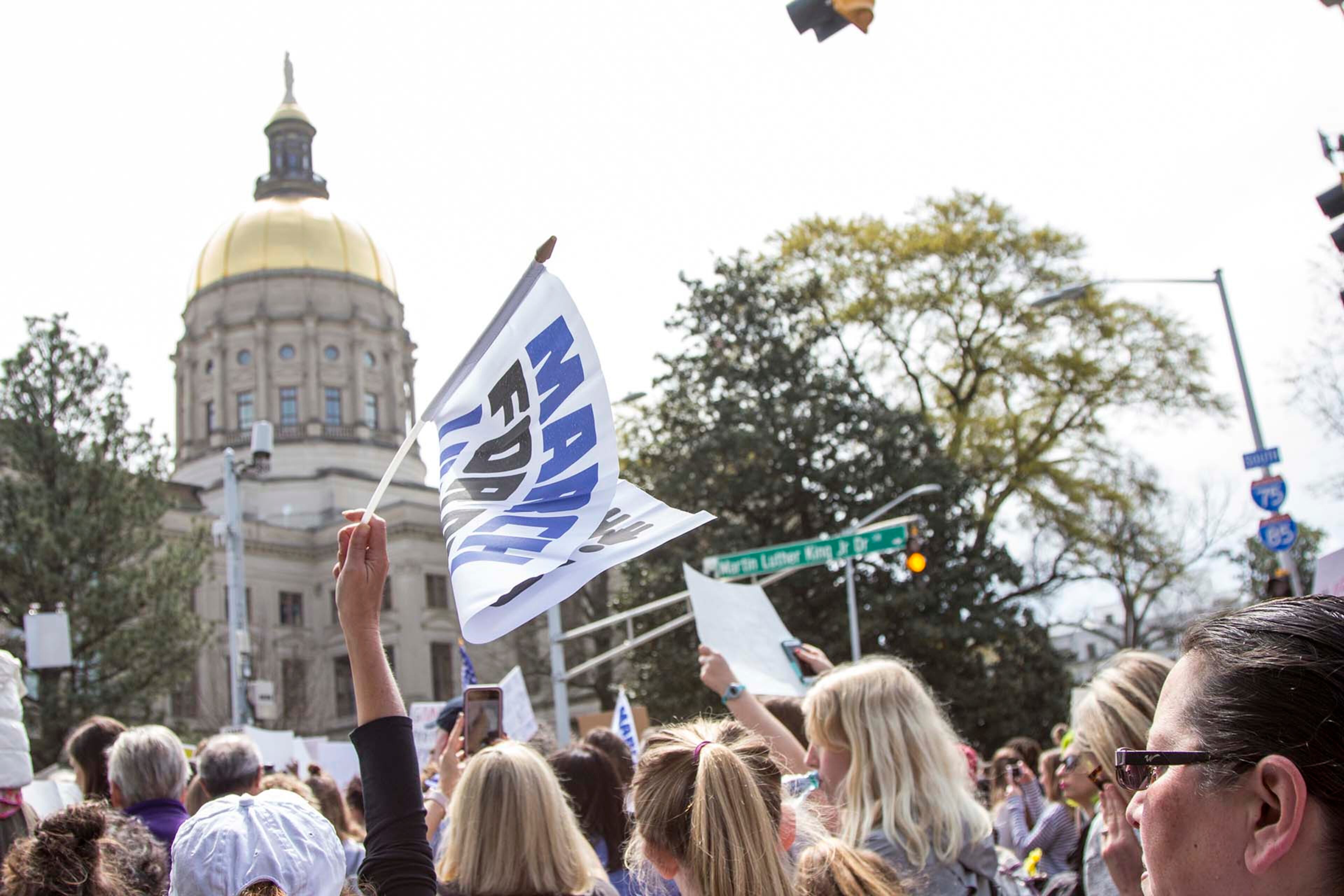People march through the streets of Atlanta during the March for our Lives event in Atlanta, Georgia, on Saturday, March 24, 2018. (REANN HUBER/REANN.HUBER@AJC.COM)