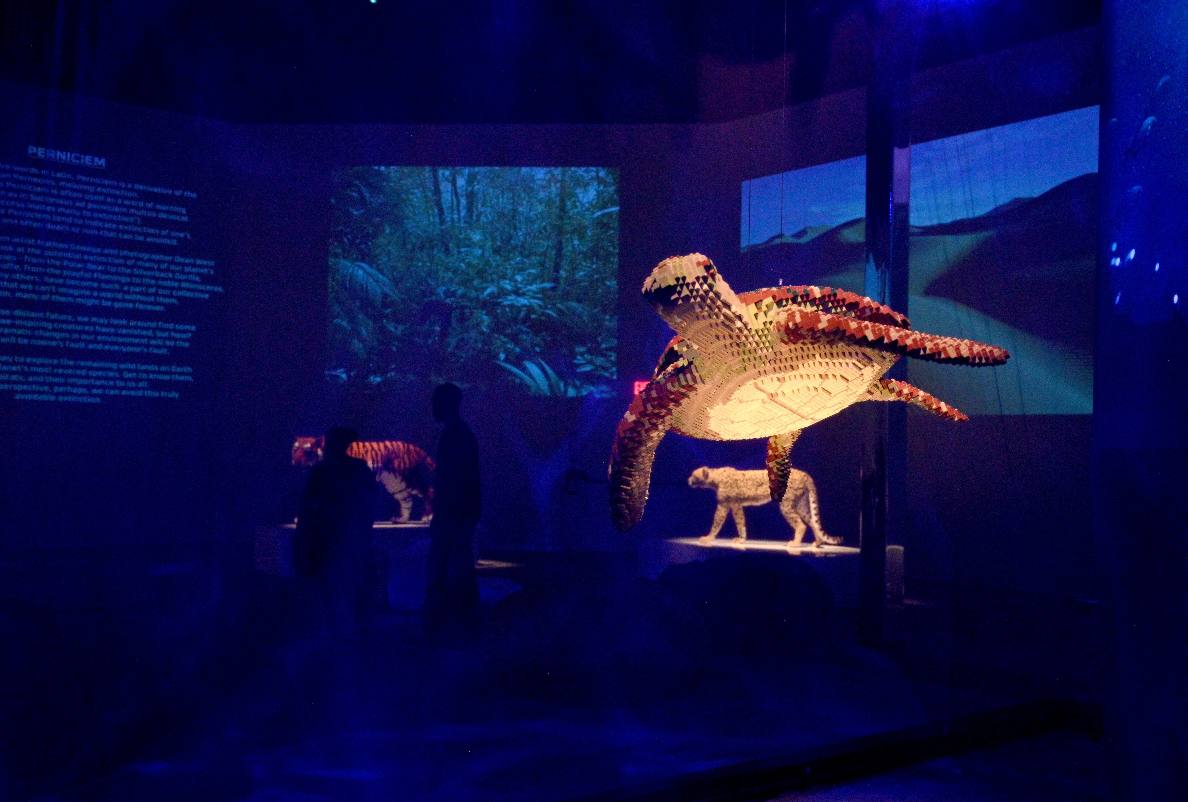 Lego sculptures in “Perniciem” room at "Art of the Brick Immersive Experience" exhibition at Exhibition Hub Atlanta Art Centre, Wednesday, April 19, 2023, in Doraville. The exhibition will feature many pieces and themes, including a room with oversized sculptures (25-foot long), over 70 works of art crafted from more than 1 million LEGO bricks, galleries celebrating human-kind and nature, and a short documentary about how Nathan creates his works. (Hyosub Shin / Hyosub.Shin@ajc.com)