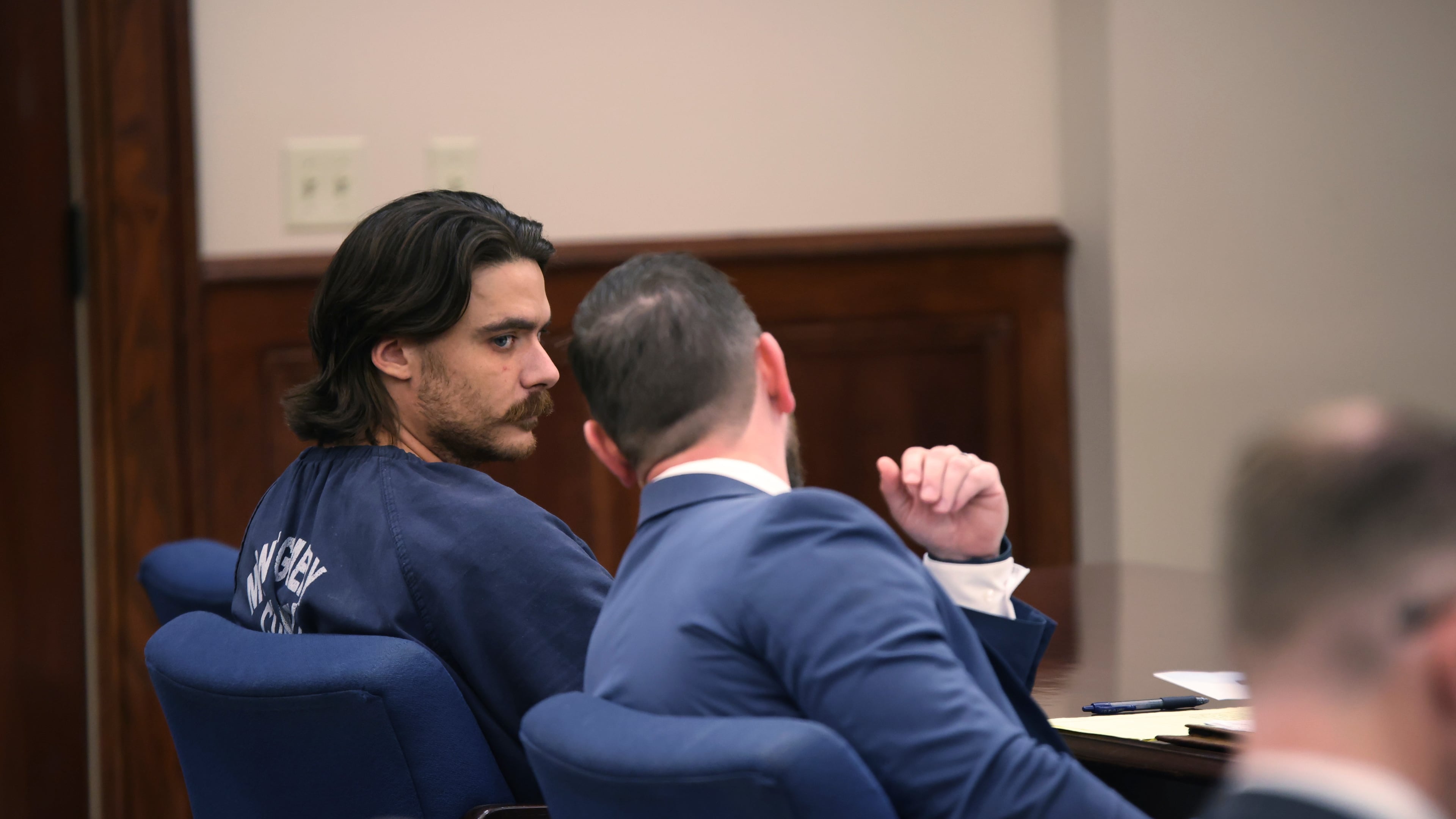 Dalton Eatherly, who goes by the moniker Chud the Builder, speaks with attorney Jacob Fendley during a hearing at the Montgomery County Courthouse, Thursday, May 21, 2026, in Clarksville, Tenn. (AP Photo/Adin Parks)