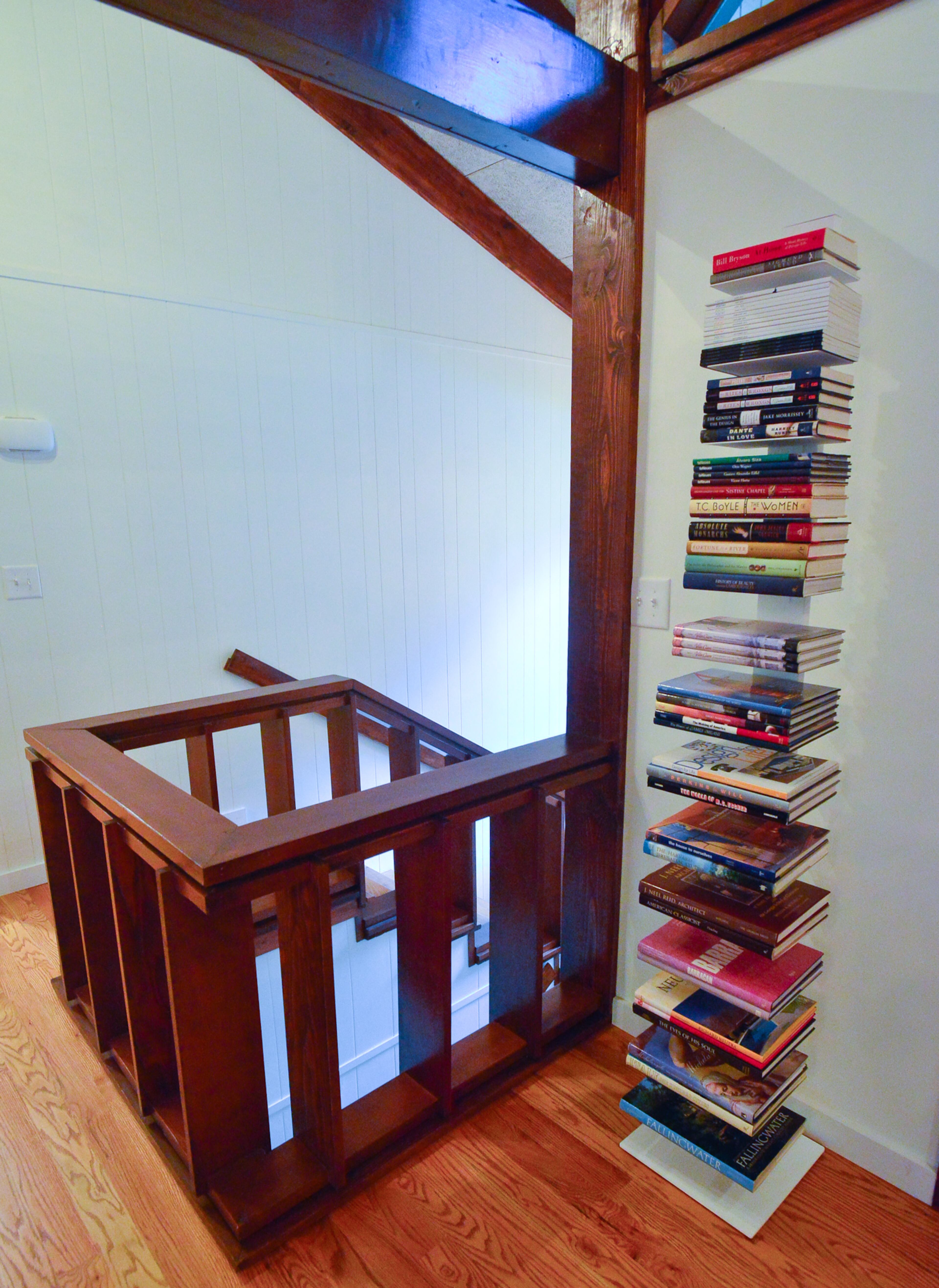 The mid-century modern Atlanta home is not filled with tchtochkes, but the homeowners admit to having a weak spot for books. The vertical Sapien bookcase from Design Within Reach holds some of their collection.