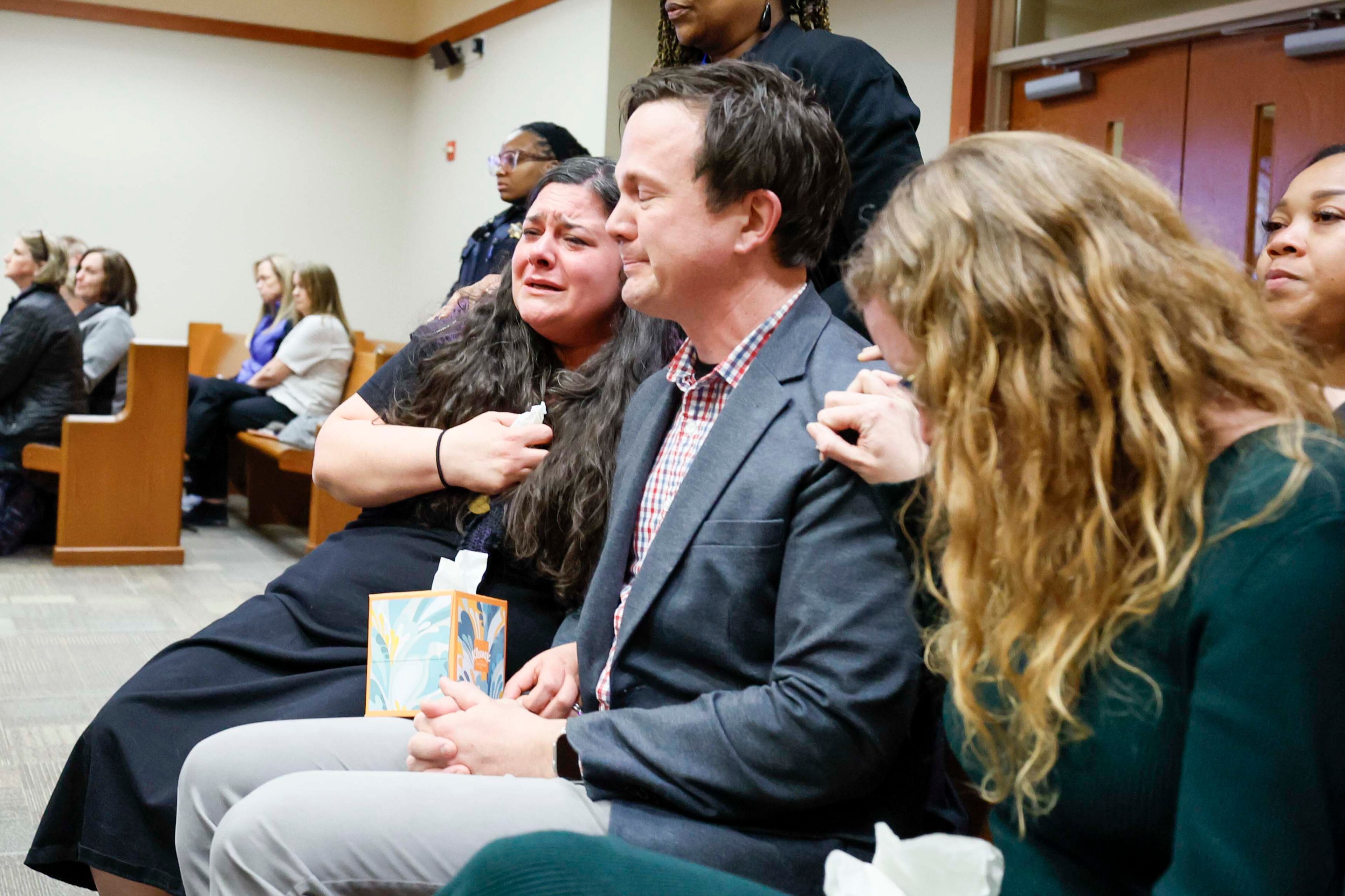Samuel Jenness and Leah Tracosas Jenness, left, react as they hear the verdict for Michelle Wierson at the DeKalb County Superior Court on Wednesday, Feb. 25, 2026. Michelle Wierson was found guilty of two counts of vehicular homicide and reckless driving in the 2018 death of 5-year-old Miles Jenness. (Miguel Martinez/AJC)