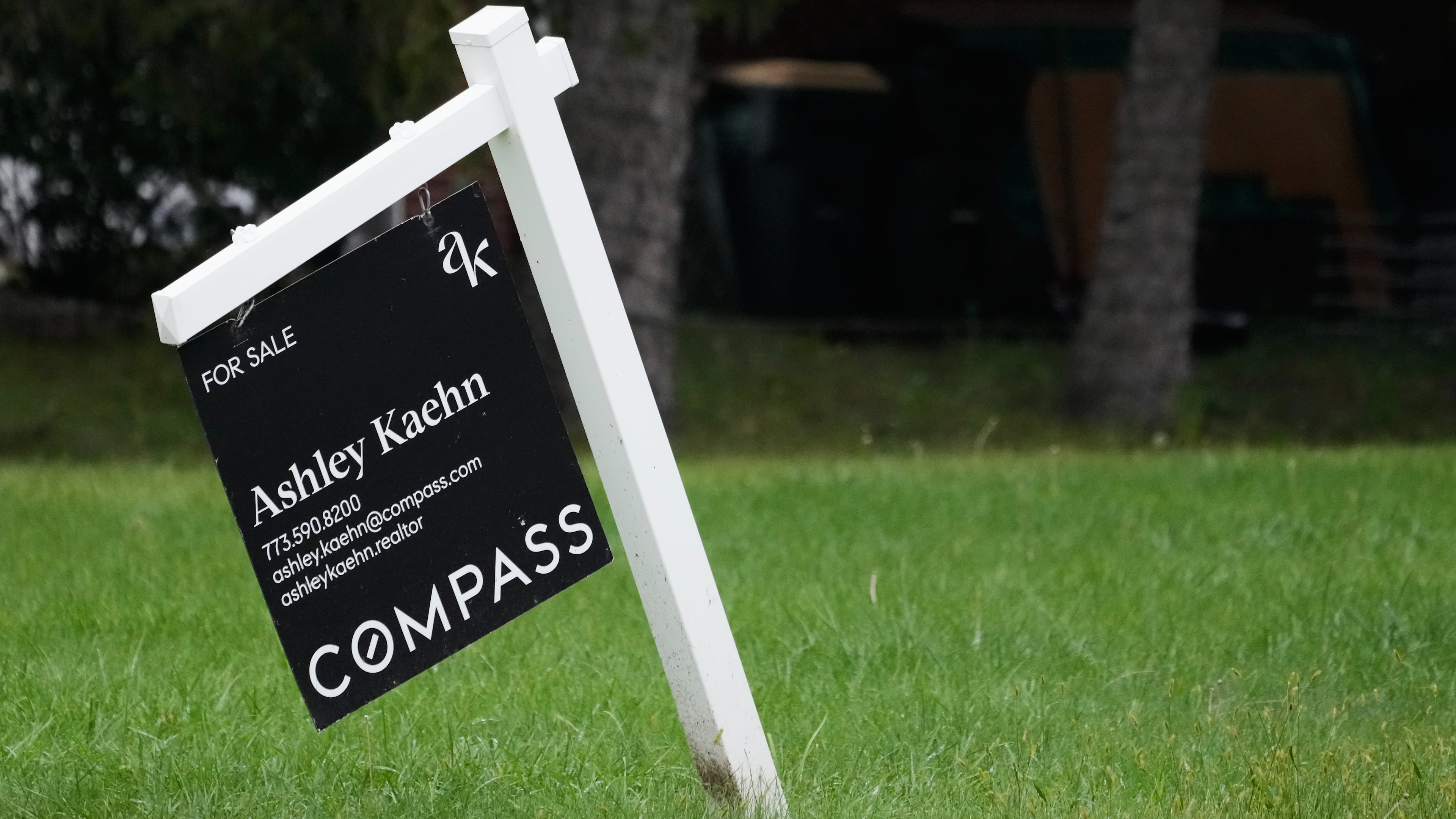 For sale sign is seen outside of a home in Arlington Heights, Ill., Wednesday, Sept. 16, 2026. (AP Photo/Nam Y. Huh)