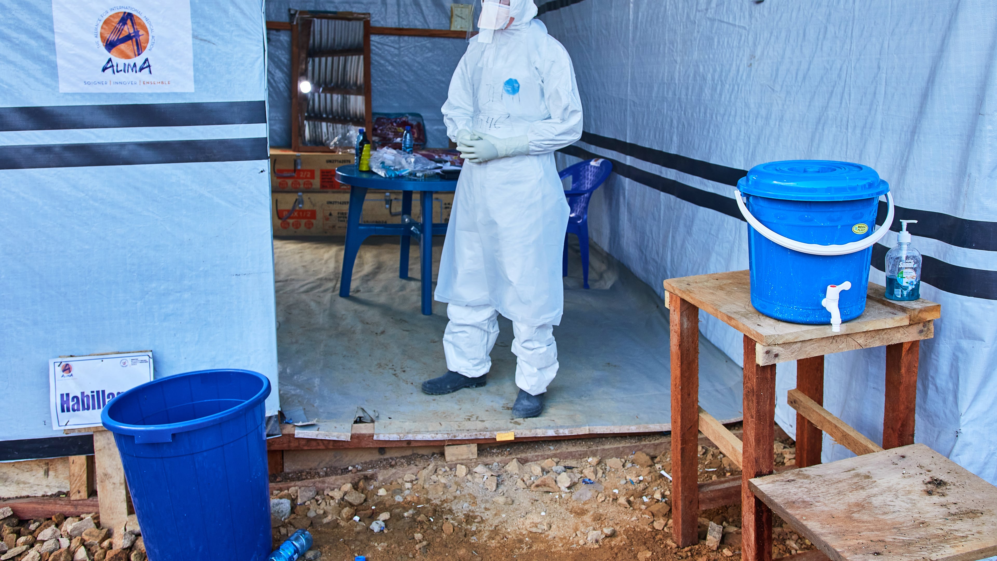 A health worker stands at the Evangelical Medical Center, in Bunia, eastern Congo, Friday, July 3, 2026, where Ebola clinical trials are scheduled to take place. (AP Photo/Dirole Lotsima Dieudonne)