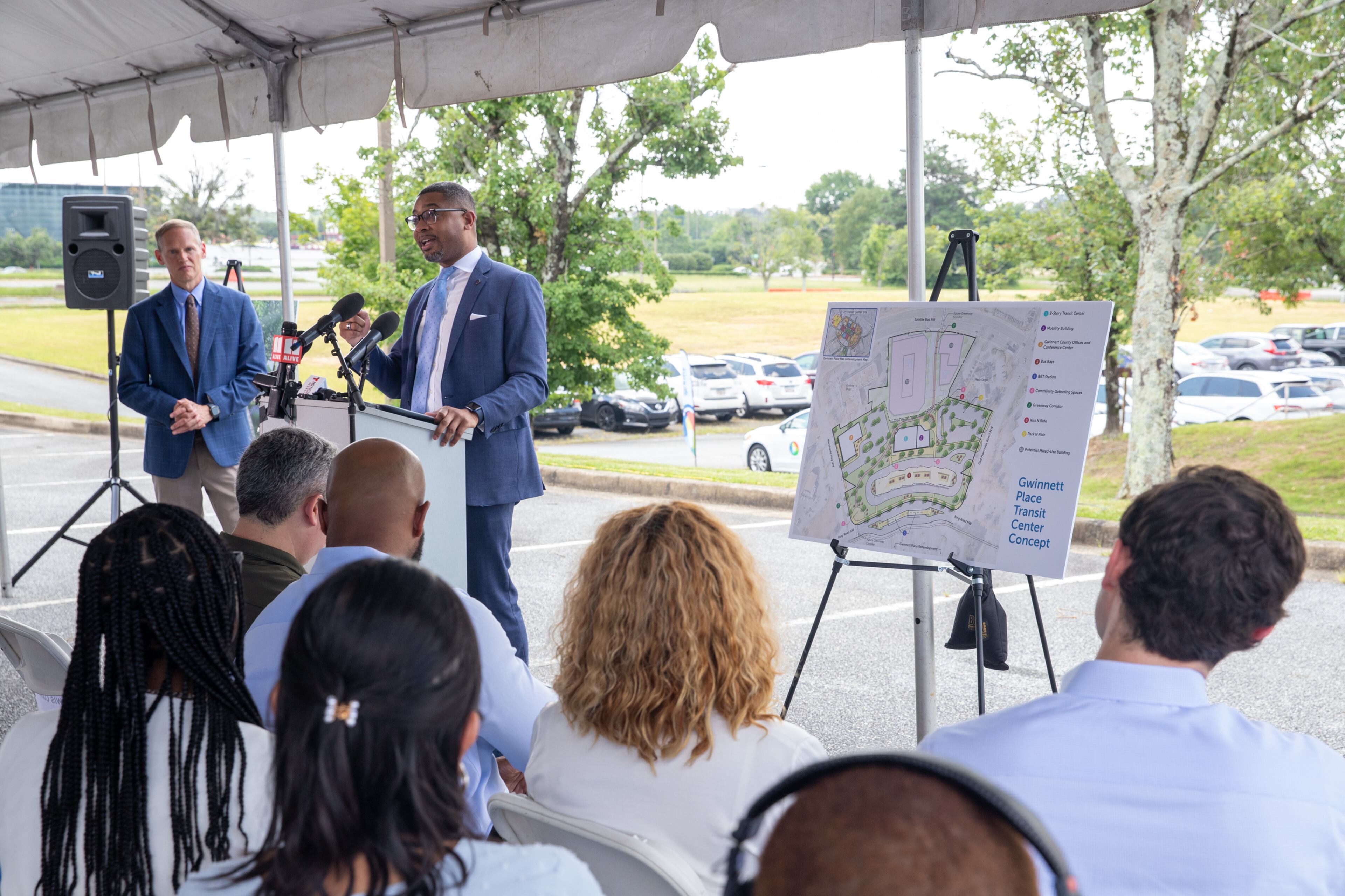 Assistant Secretary of Transportation Christopher Coes takes questions at the Gwinnett County celebration a $20 million federal grant Monday, July 24, 2023 awarded to transform the transit center just west of Gwinnett Place Mall. (Jenni Girtman for The Atlanta Journal-Constitution)