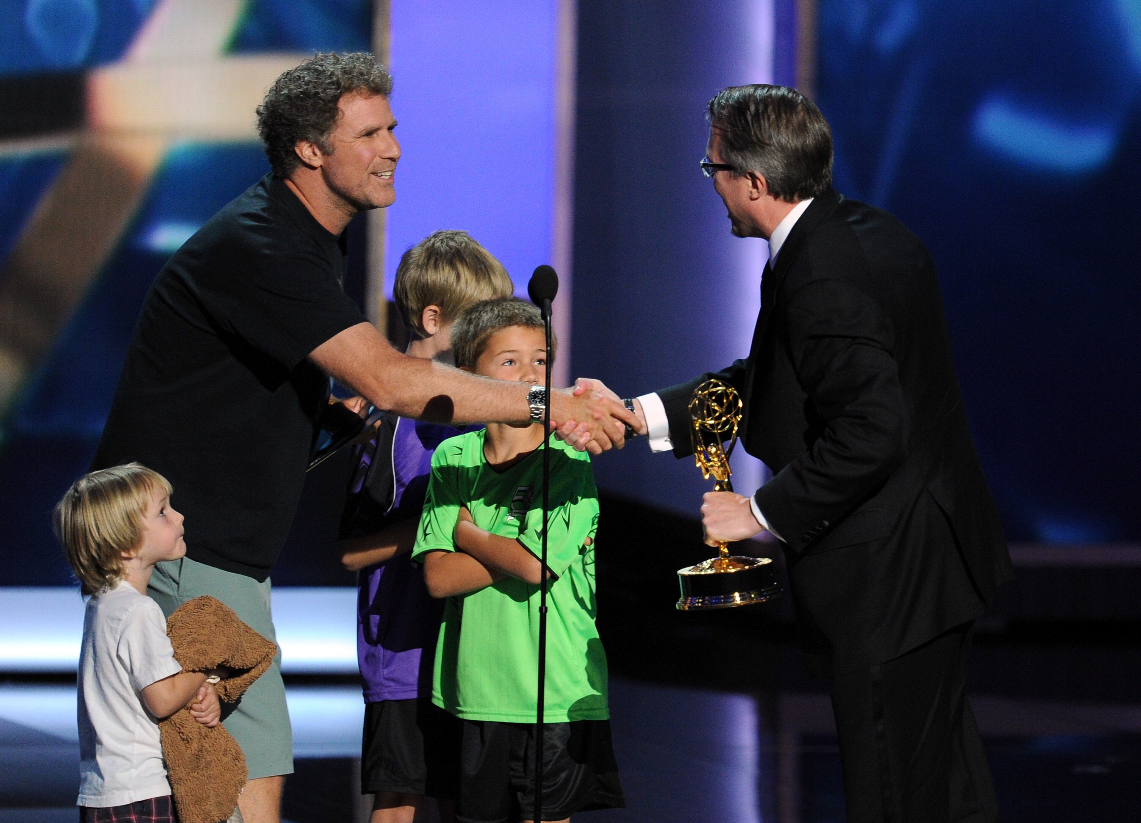 LOS ANGELES, CA - SEPTEMBER 22: Actor Will Farrell presents the award for Best Drama Series to Vince Gilligan onstage during the 65th Annual Primetime Emmy Awards held at Nokia Theatre L.A. Live on September 22, 2013 in Los Angeles, California. (Photo by Kevin Winter/Getty Images)