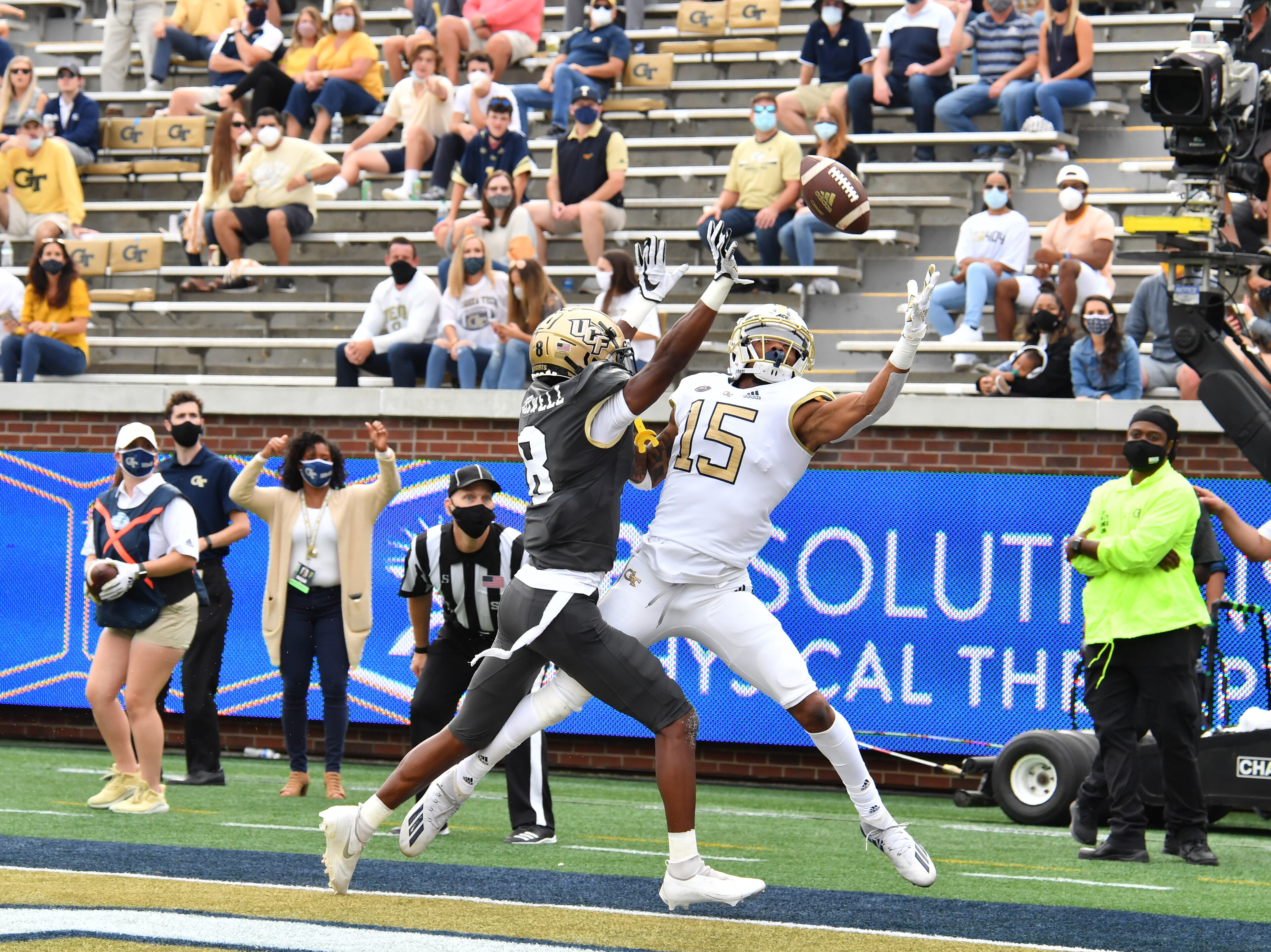 September 19, 2020 Atlanta - Georgia Tech's wide receiver Malachi Carter (15) is not able to catch a pass under pressure from University of Central Florida's defensive back Zamari Maxwell (8) during the first half of an NCAA college football game at Georgia Tech's Bobby Dodd Stadium in Atlanta on Saturday, September 19, 2020. (Hyosub Shin / Hyosub.Shin@ajc.com)