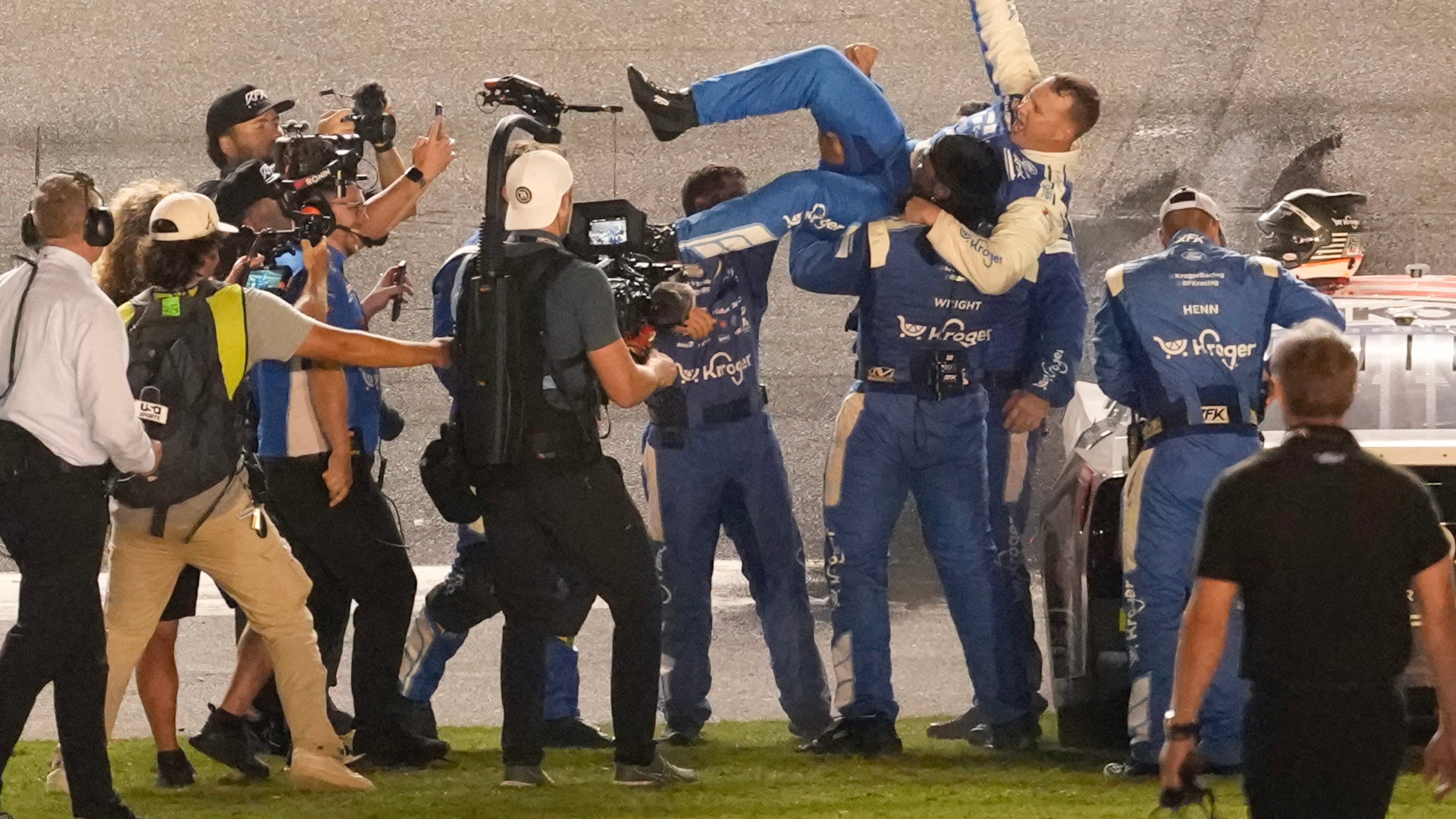 Ryan Preece, center, celebrates with his crew after winning the NASCAR auto race at Daytona International Speedway, Saturday, Aug. 29, 2026, in Daytona Beach, Fla. (AP Photo/John Raoux)