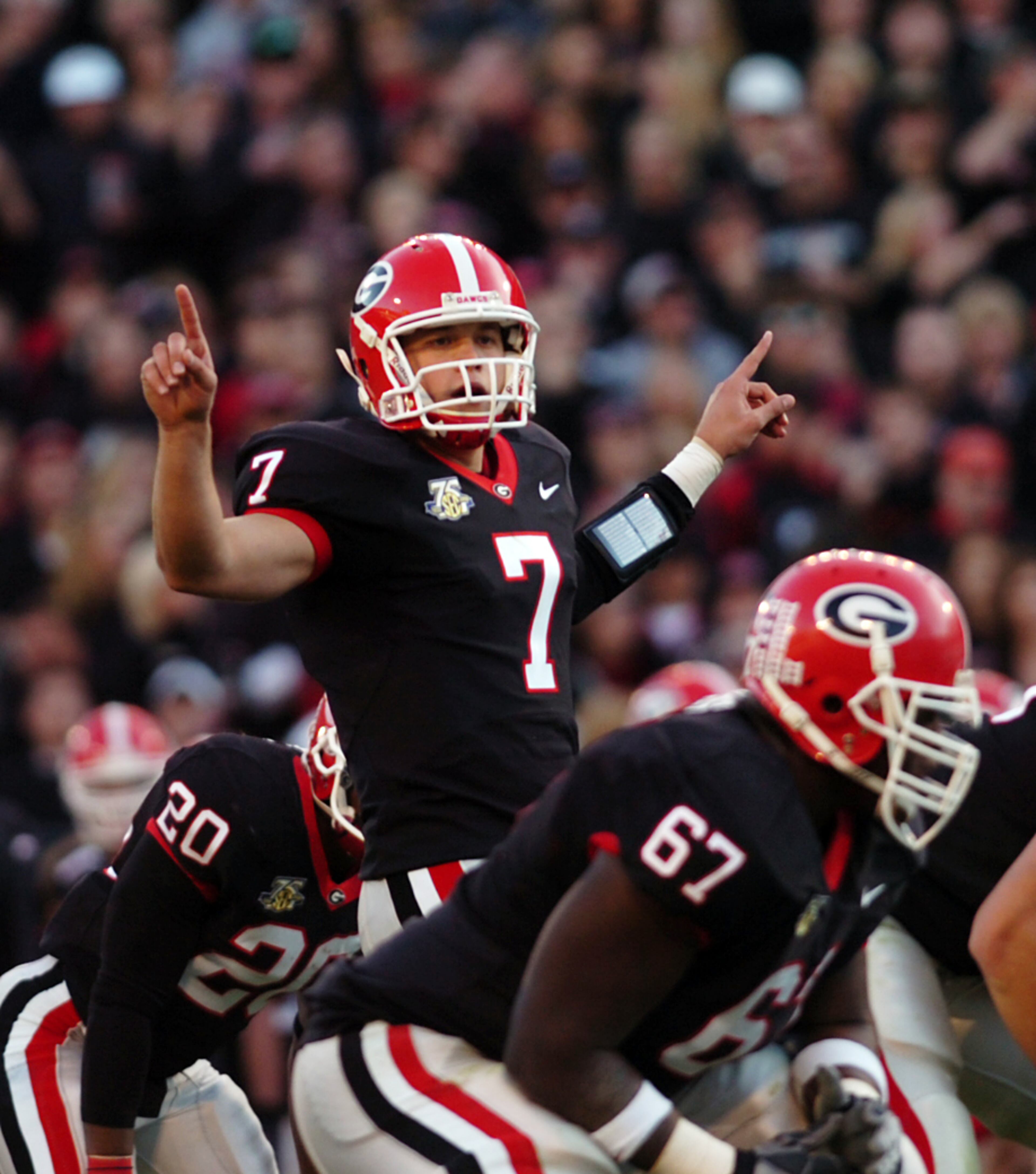 Georgia quarterback Matthew Stafford calls a play at the line against Auburn at Sanford Stadium on Saturday, Nov 10, 2007. (ELISSA EUBANKS/STAFF)