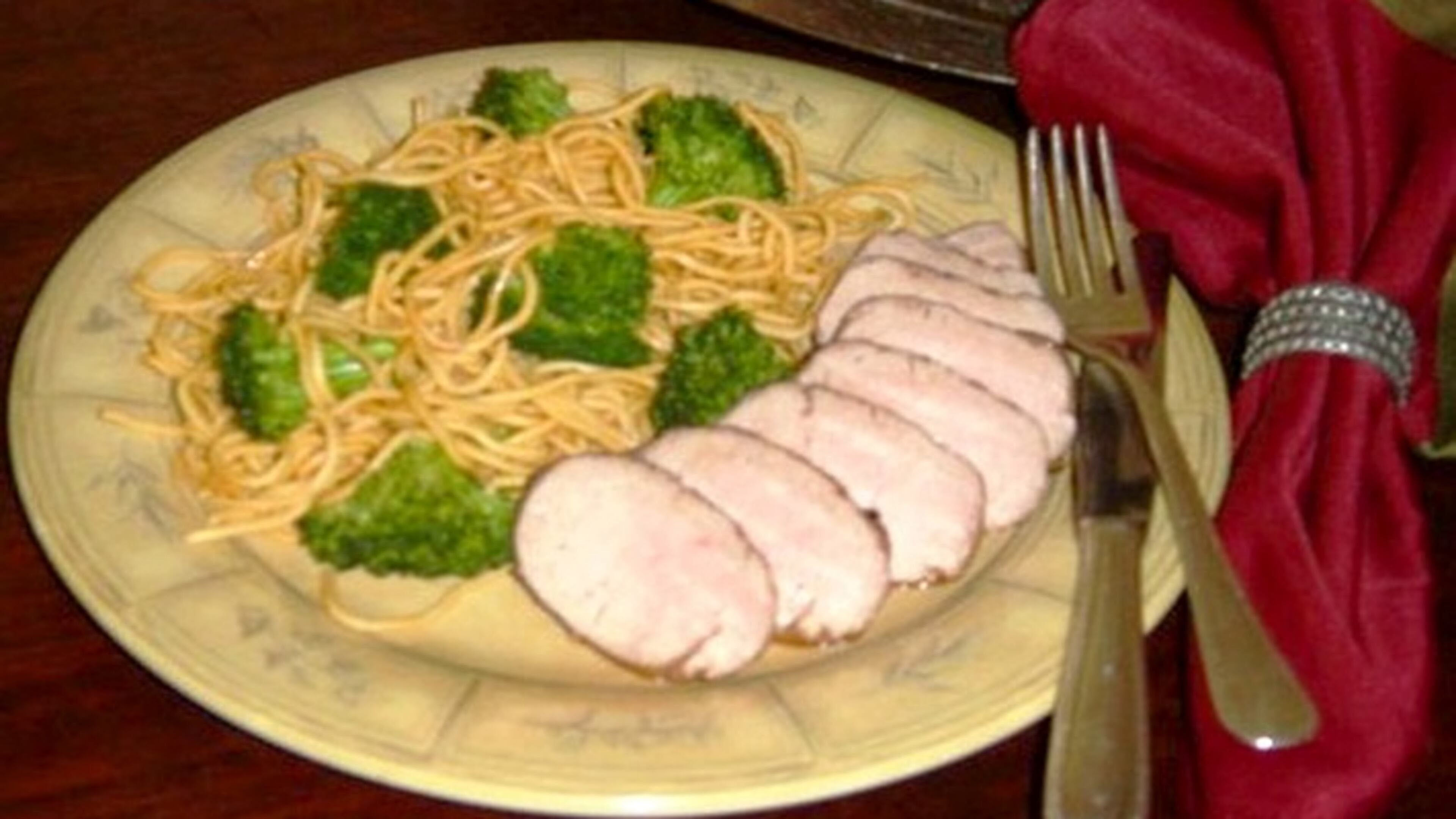 Asian-Flavored Pork Tenderloin with Stir-fried Broccoli and Noodles. (Linda Gassenheimer)