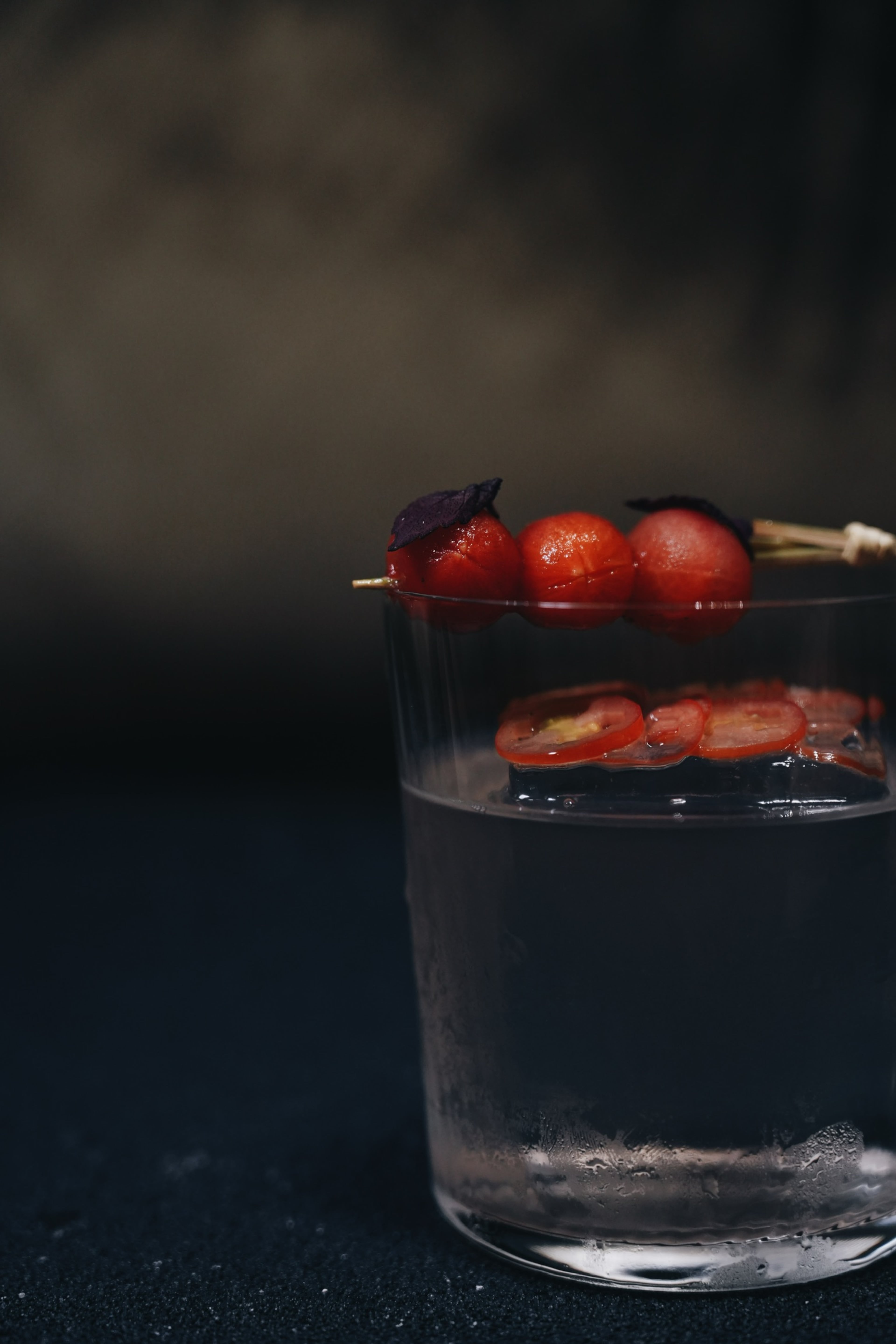 At Lucky Star's cocktail omakase, this "salad" course is a caprese and tonic cocktail that uses clarified tomato juice and is garnished with delicate, frozen slices of tomato. (Courtesy of ChingYao Wang)