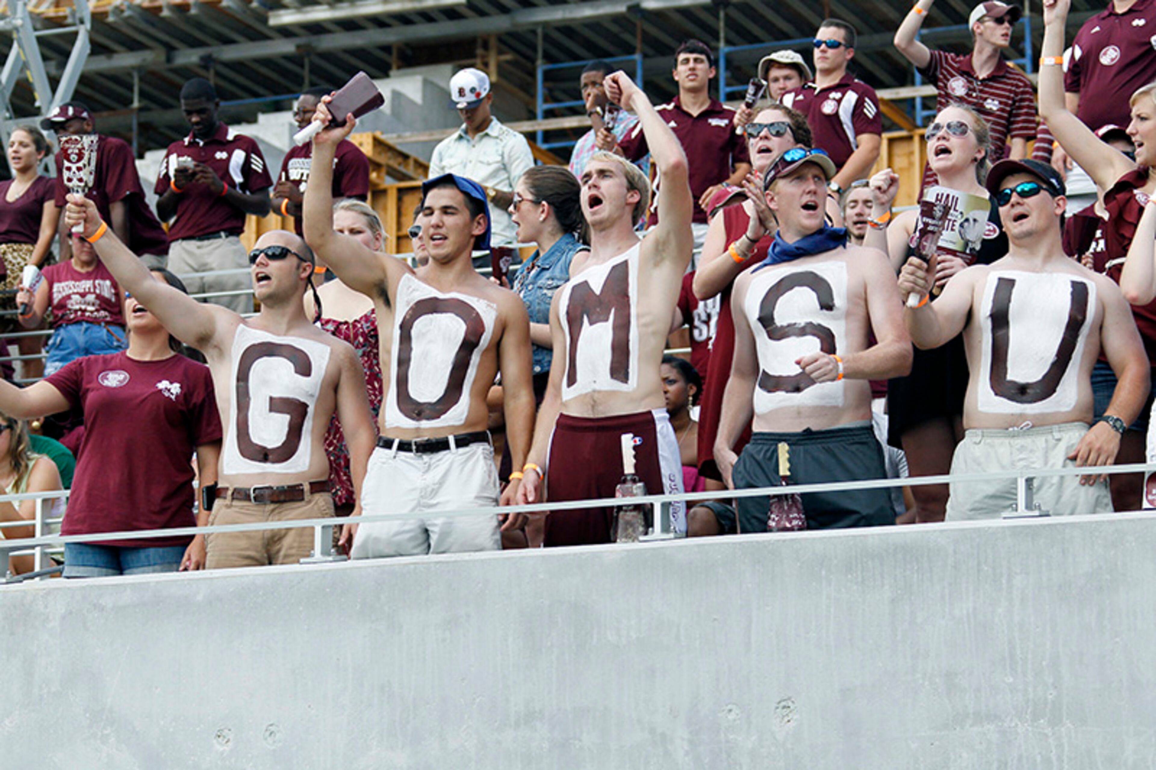 Mississippi State fans cheer in the second quarter of their NCAA college football game against Alcorn State at the Davis Wade Stadium, in Starkville, Miss. Mississippi State won 51-7.