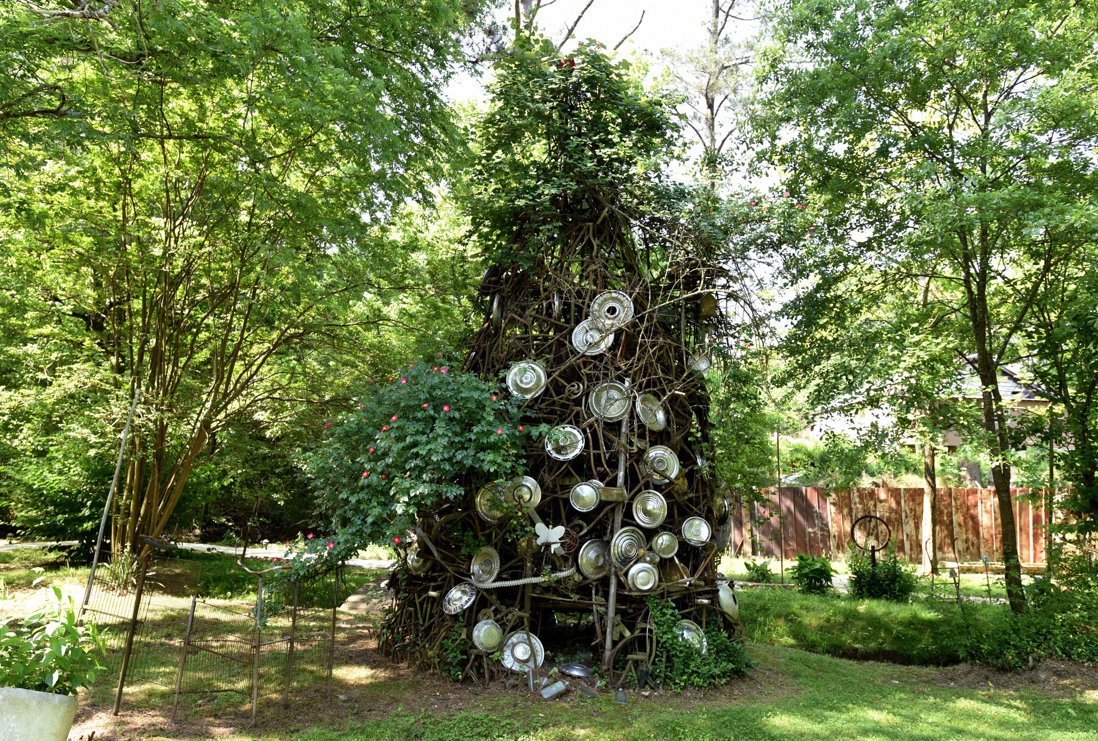 May 9, 2015 Summerville - Picture shows folk artist Howard Finster's Paradise Garden in Summerville on Saturday, May 9, 2015. Famous folk artist Howard Finster began creating Paradise Gardens in 1961. It is listed as one of Georgia's noted art attractions. Finster's outsider art -- sculpture and paintings -- draws tourists from around the world. In advance of Finster Fest, May 30-31 in the northwest Georgia town of Summerville. Georgia's most famed folk artist, Finster was known as a great American eccentric, and plenty of eccentric places survive him in this gritty corner of the state. HYOSUB SHIN / HSHIN@AJC.COM