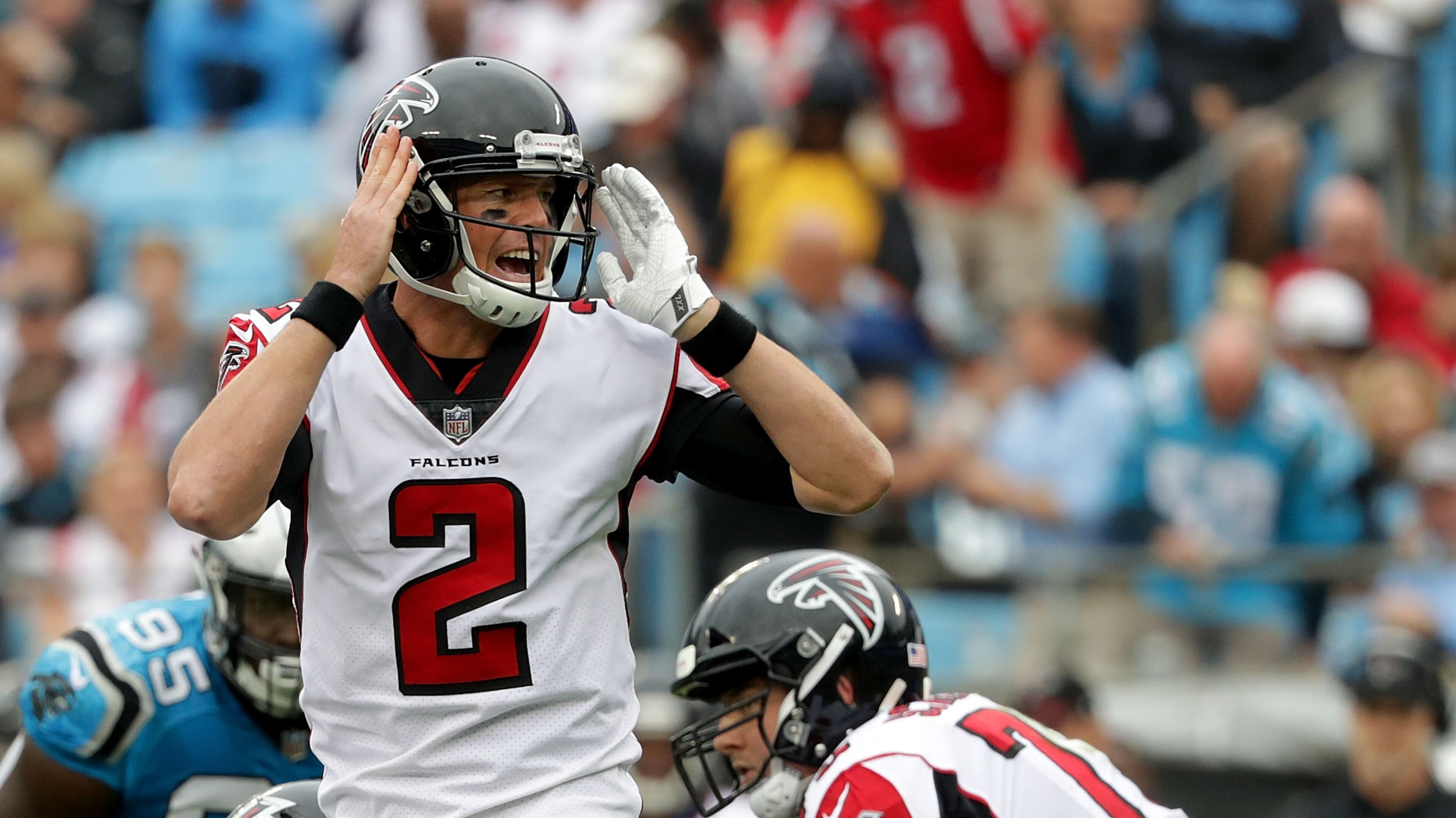 Matt Ryan of the Falcons makes a call against the Panthers in the third quarter during their game Sunday at Bank of America Stadium in Charlotte, North Carolina.