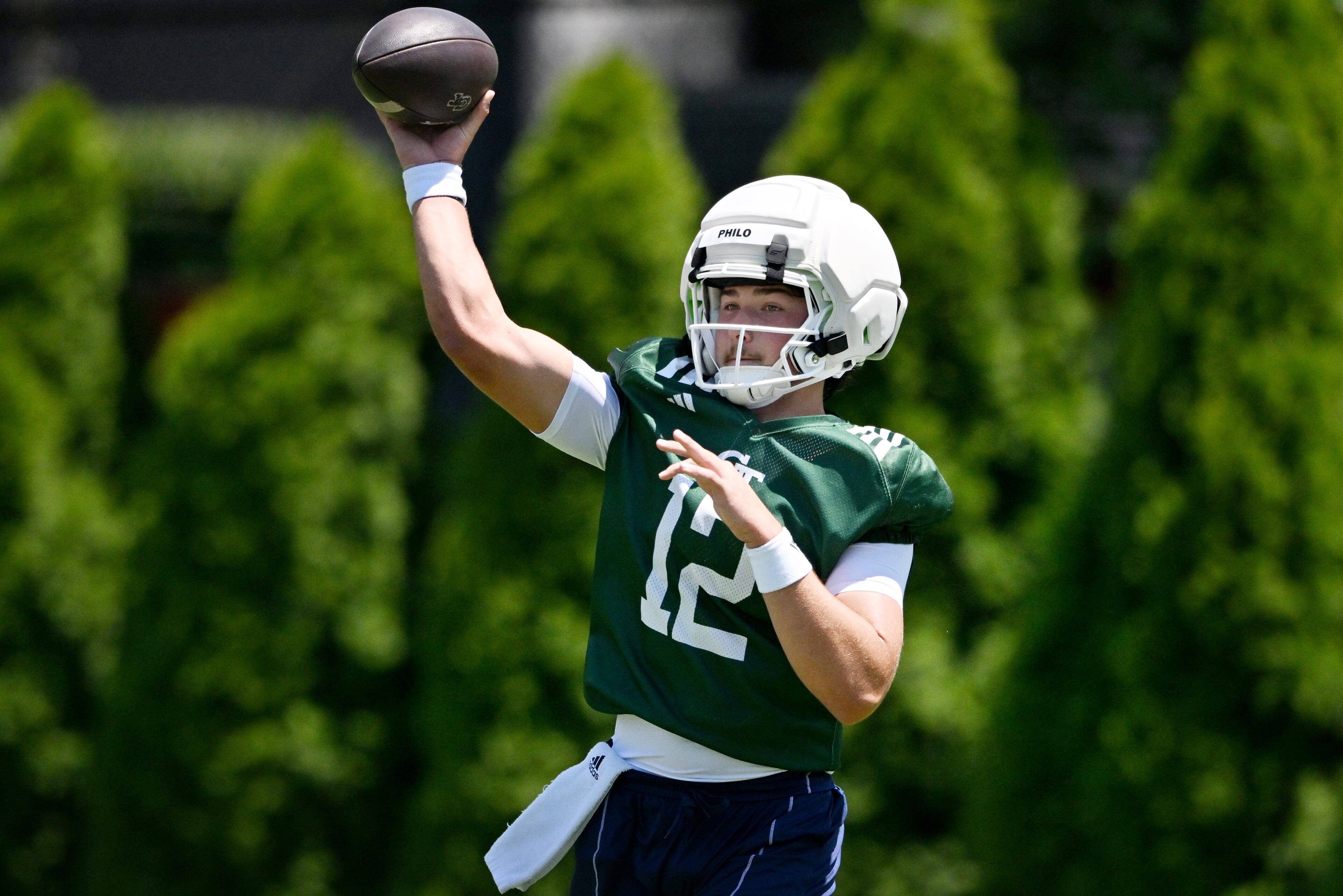 Georgia Tech quarterback Aaron Philo (12) participates in a drill during the first day of football practice at Rose Bowl Field and the Mary and John Brock Football Practice Facility, Tuesday, July 29, 2025, in Atlanta. (Hyosub Shin / AJC)