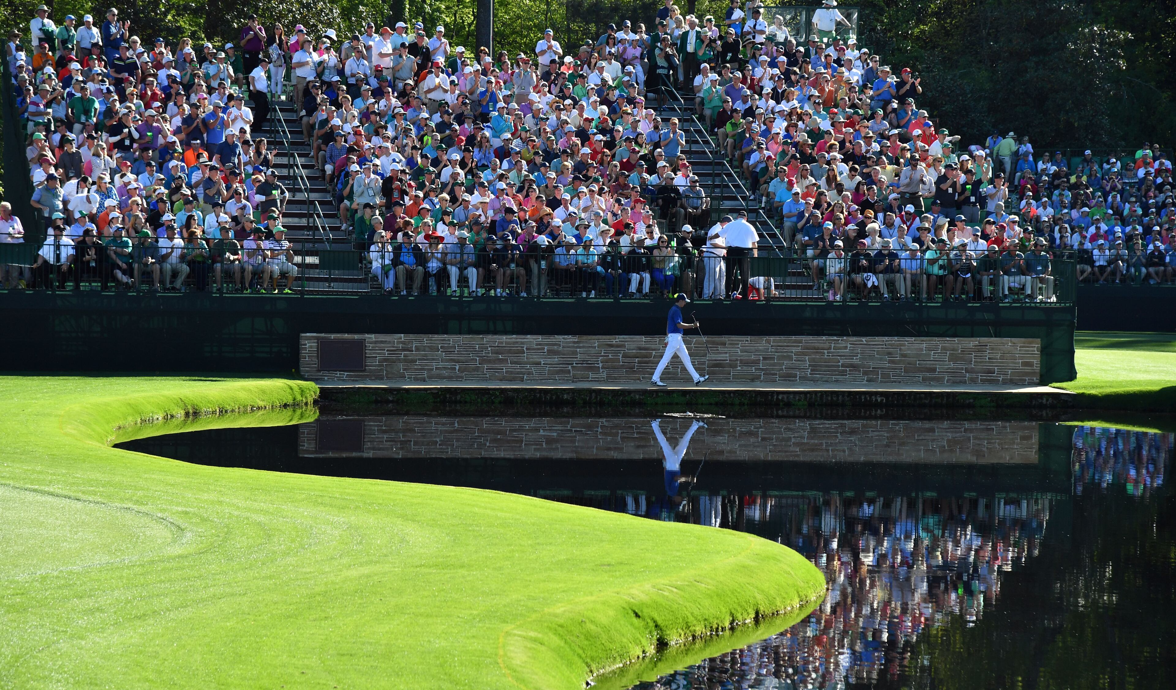 April 8, 2017 AUGUSTA Jordan Spieth walks across the bridge in front of the gallery on the 15th green. Play begins in the third round of the 81st Masters tournament at the Augusta National Golf Club, Saturday, April 8, 2017. BRANT SANDERLIN / SPECIAL